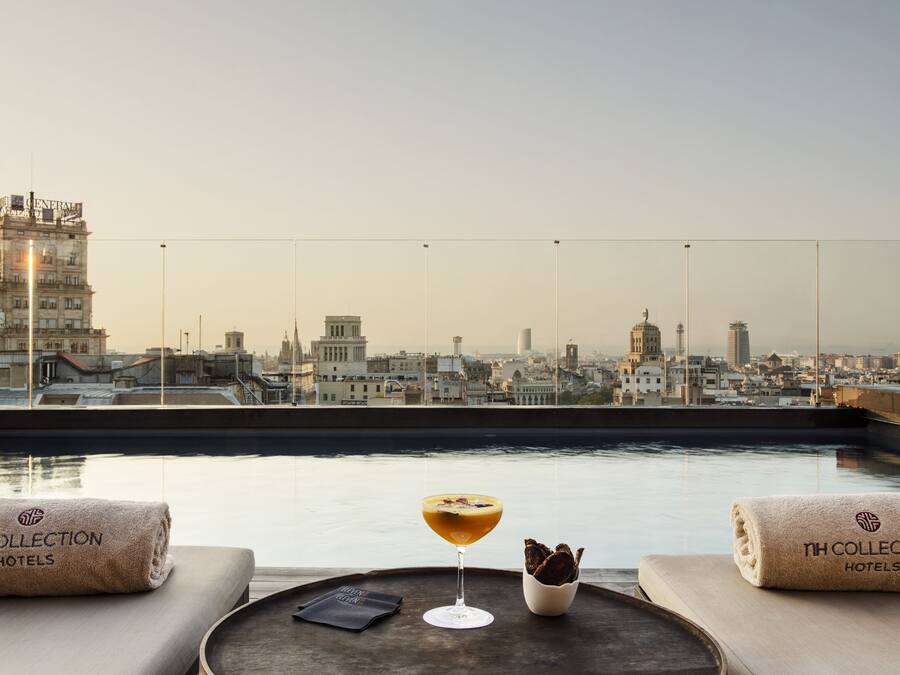 Outdoor pool, open 8:00 AM to 8:00 PM, pool umbrellas, pool loungers