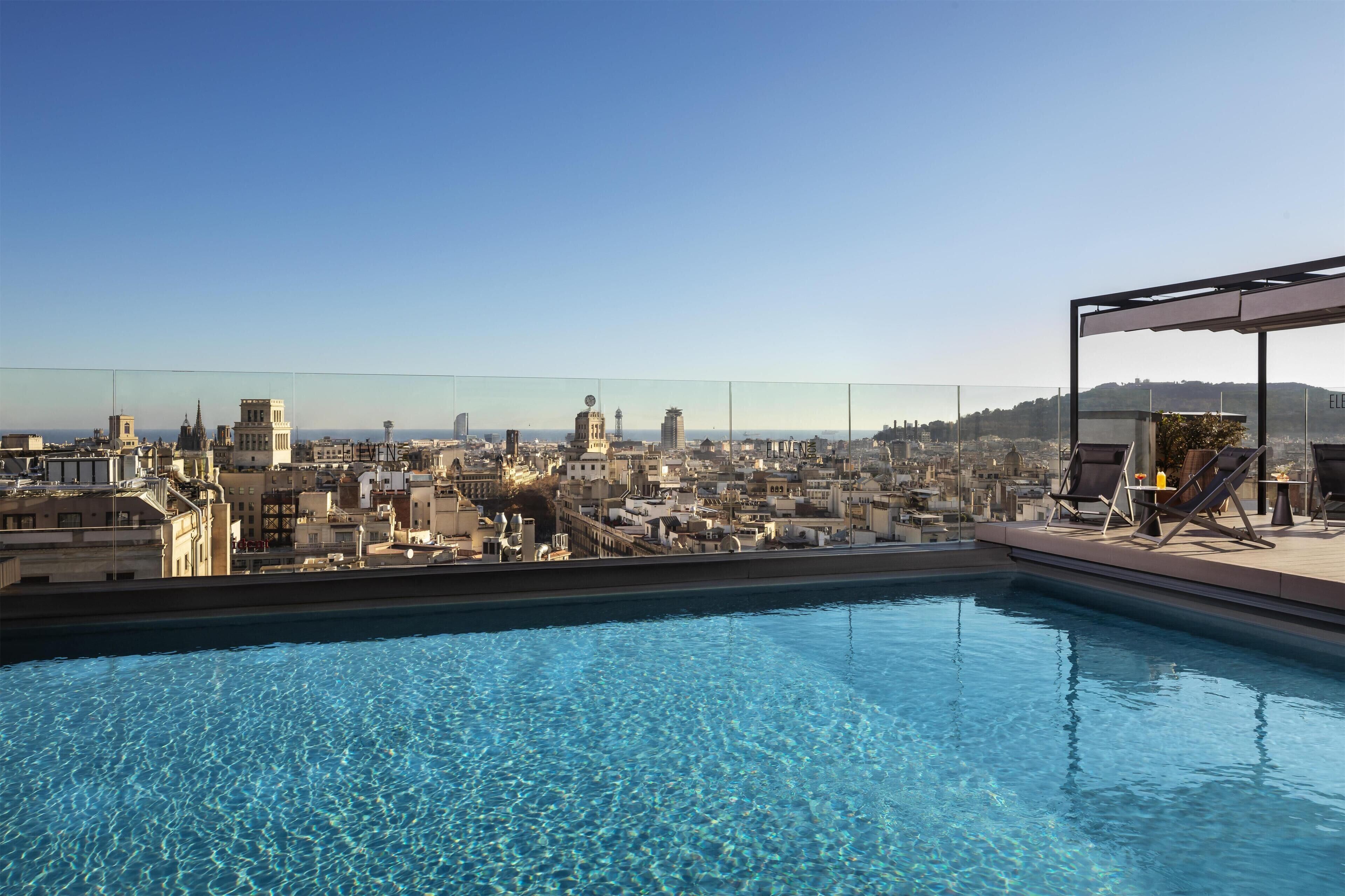 Outdoor pool, open 8:00 AM to 8:00 PM, pool umbrellas, pool loungers