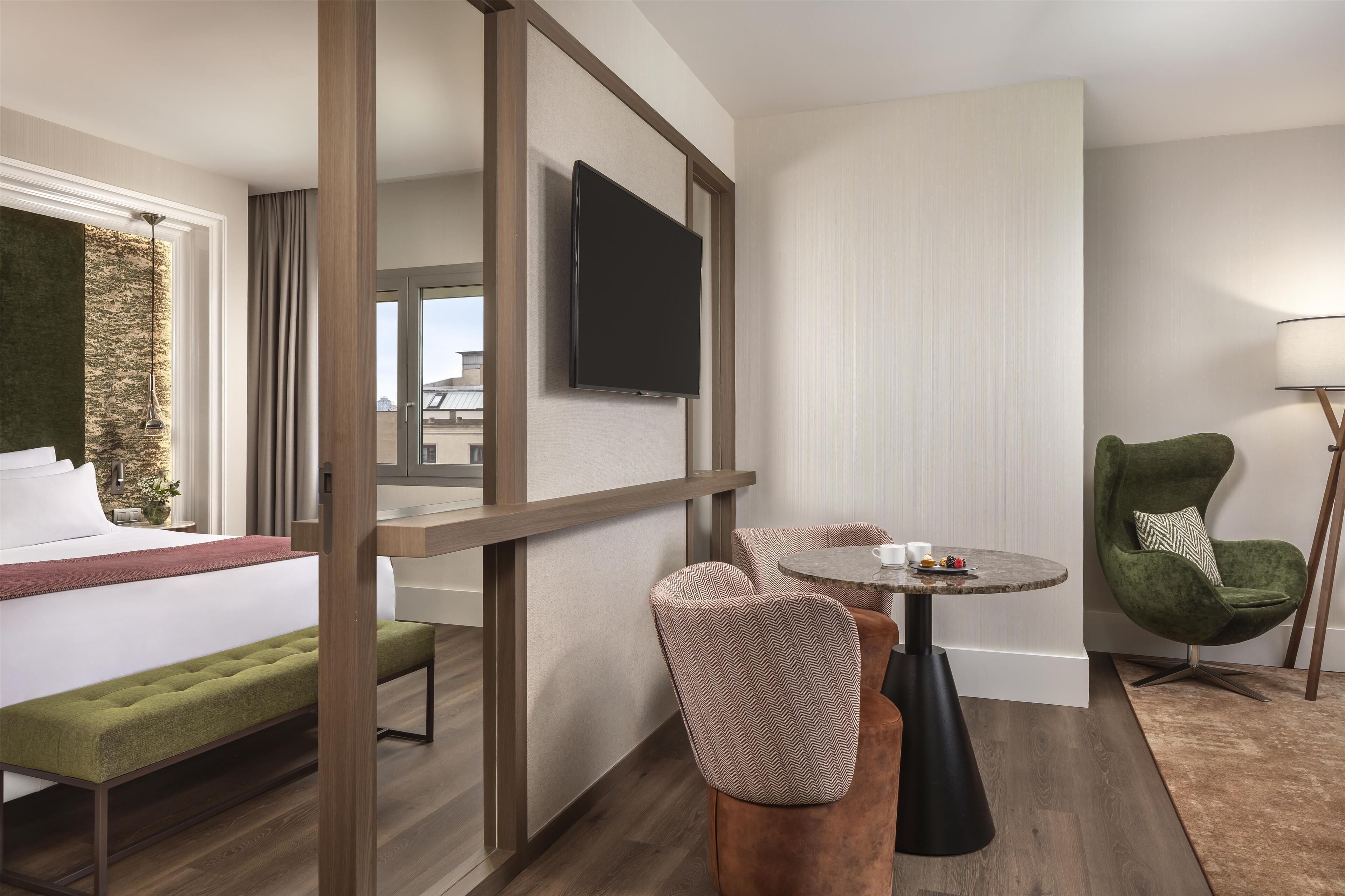 Premium bedding, down comforters, minibar, in-room safe