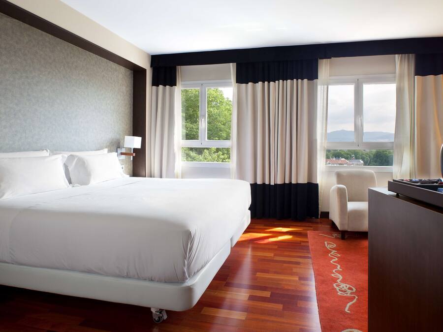 Superior Room | Minibar, in-room safe, desk, blackout curtains