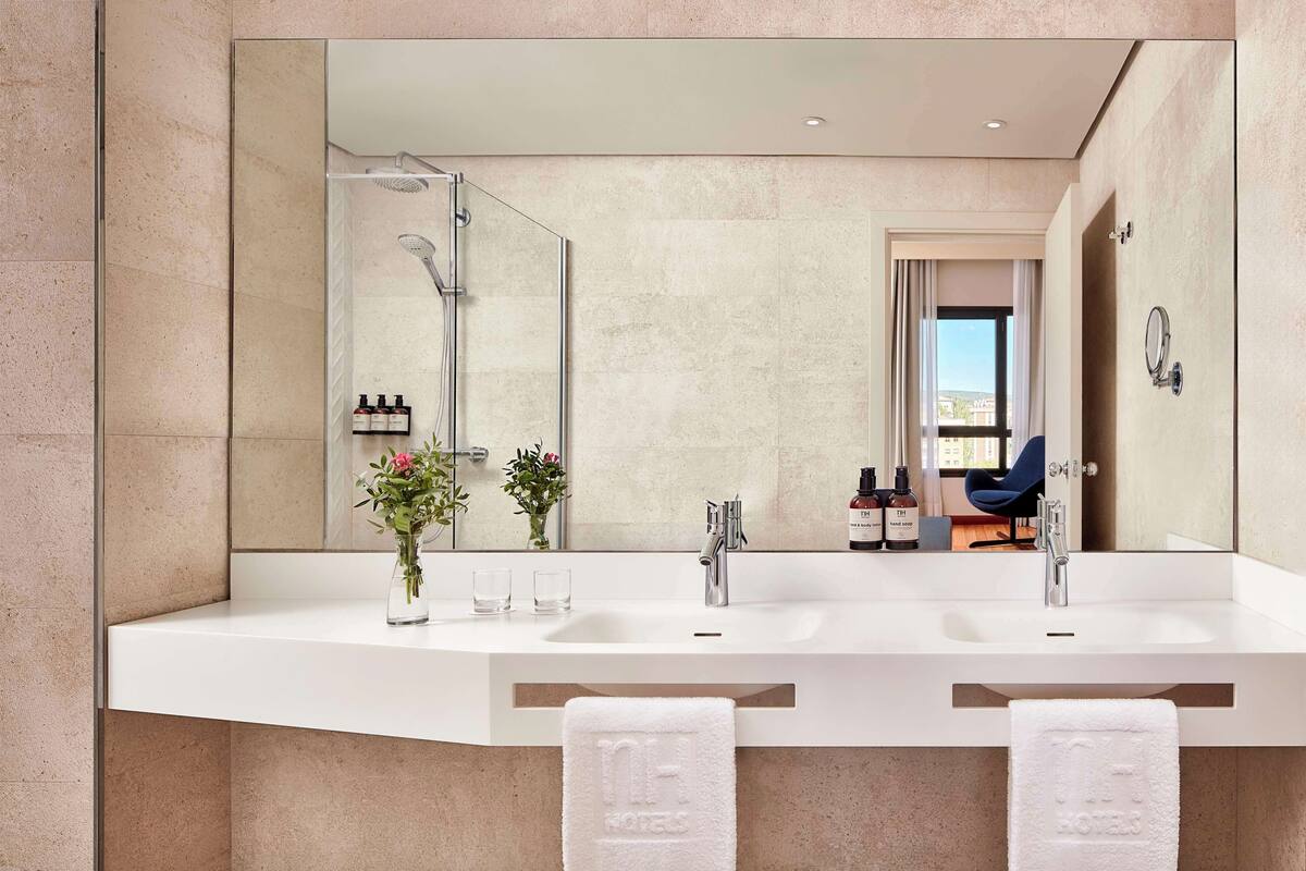 eco-friendly toiletries, hair dryer, dressing gowns, towels