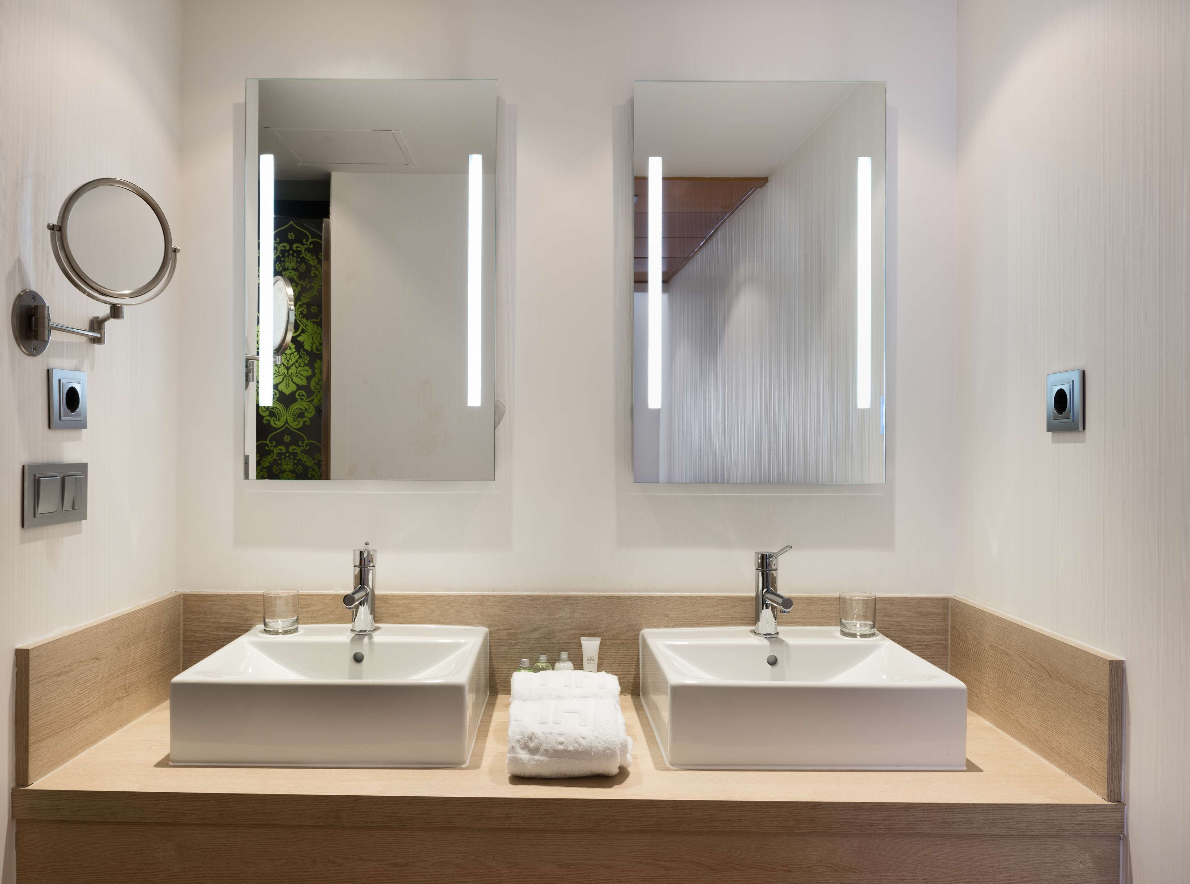 eco-friendly toiletries, hair dryer, towels