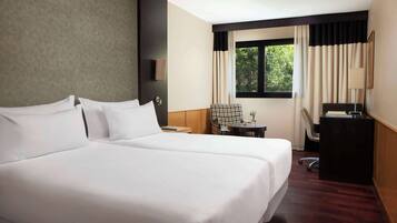 Ropa de cama de alta calidad y minibar