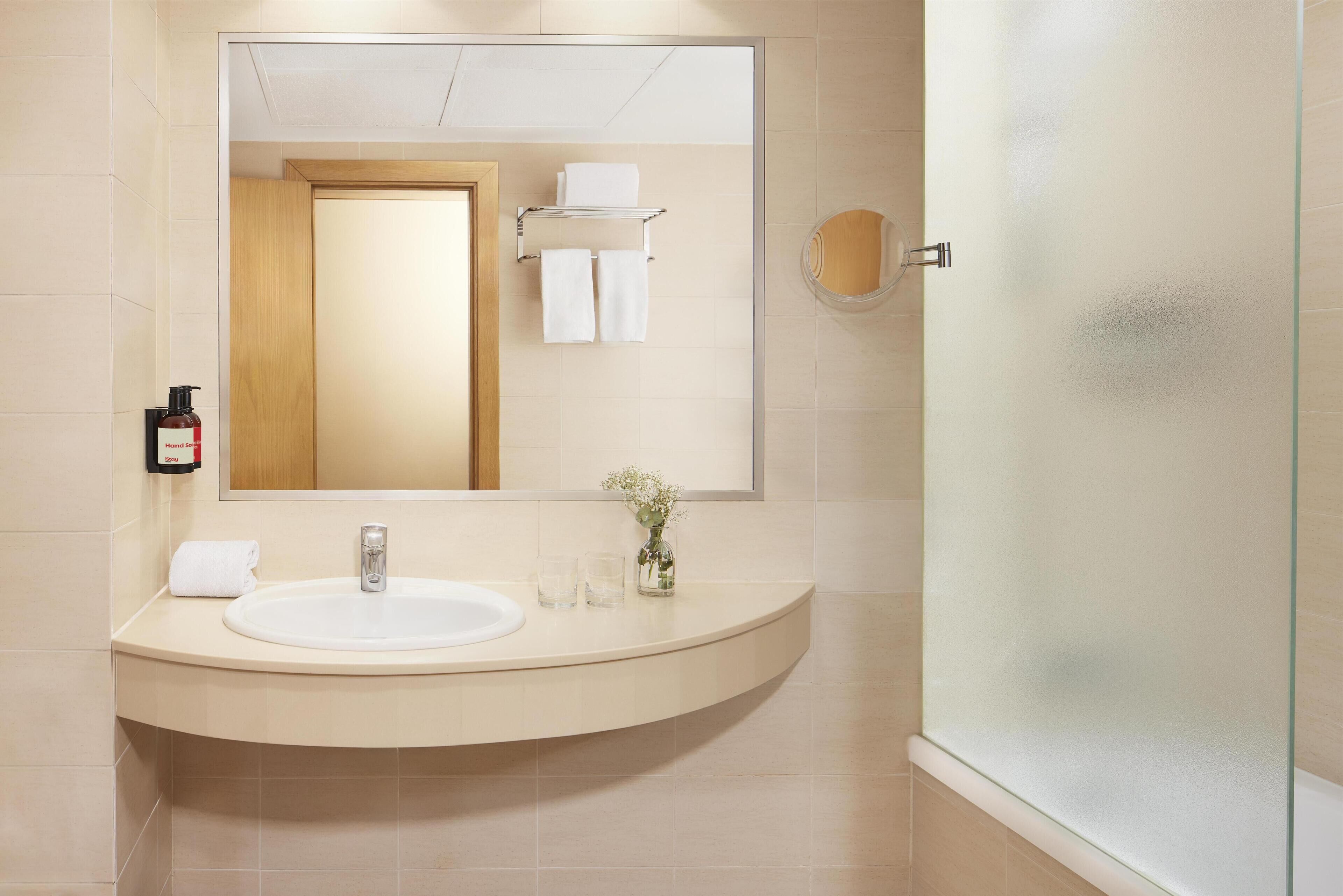 Eco-friendly toiletries, hair dryer, towels, soap