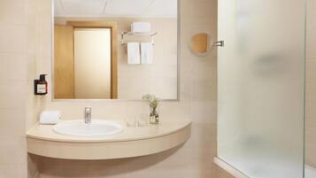 Eco-friendly toiletries, hair dryer, towels, soap