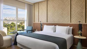 Ropa de cama de alta calidad, minibar, caja fuerte y escritorio