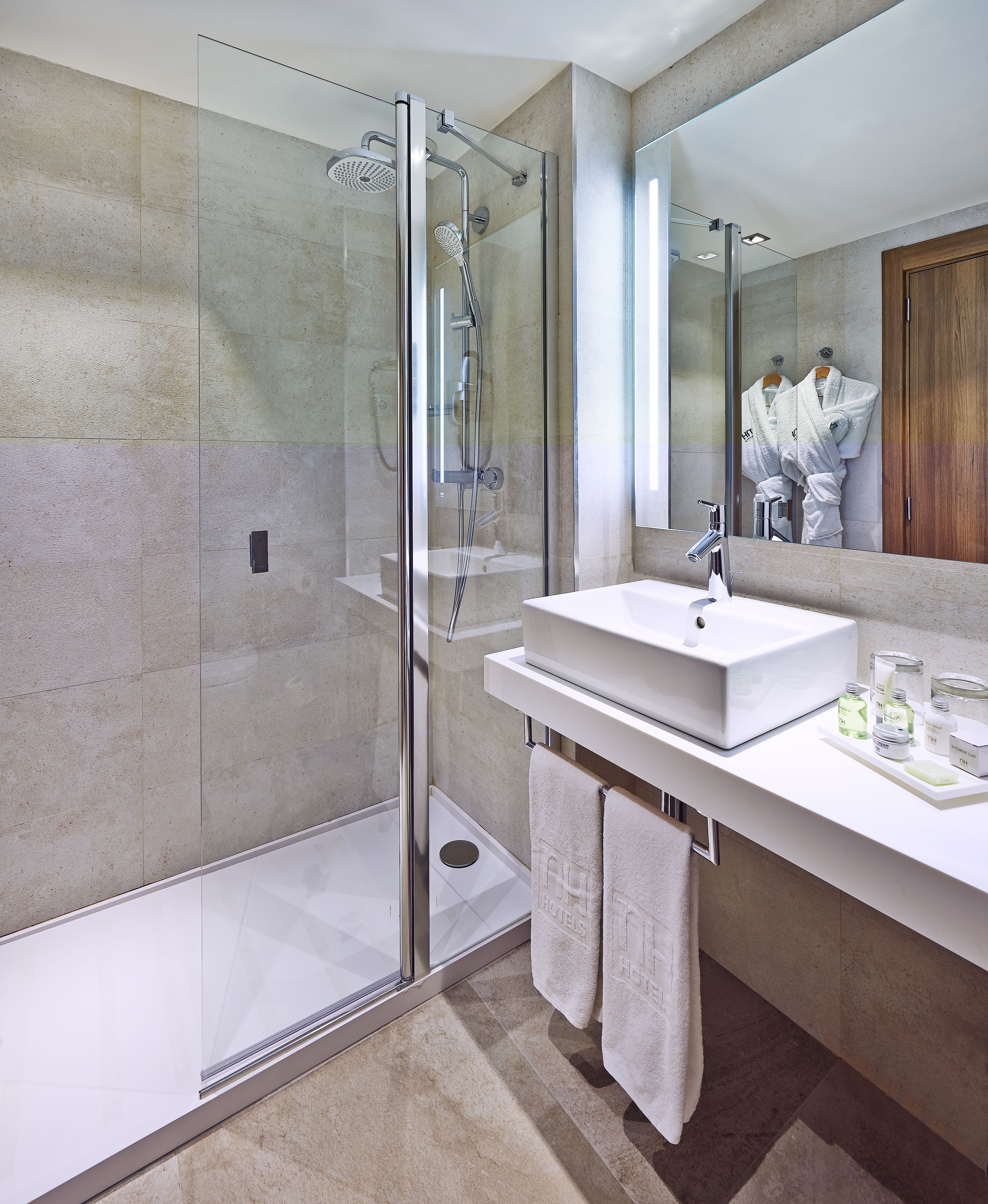 standard room (new style) | bathroom | combined shower/bathtub, eco-friendly toiletries, hair dryer, towels