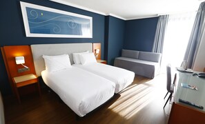 Family Triple Room | Premium bedding, minibar, in-room safe, desk