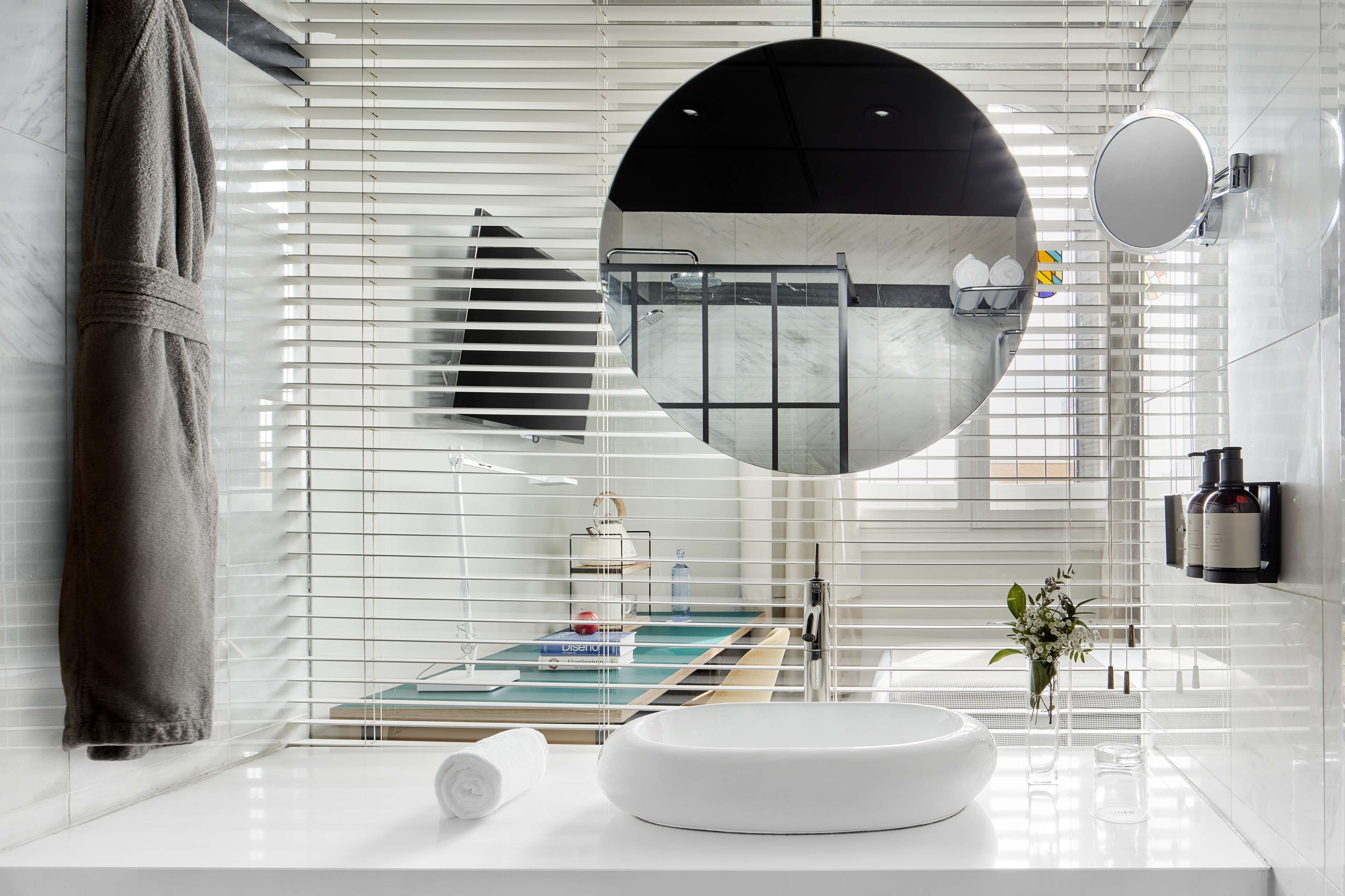 rainfall showerhead, eco-friendly toiletries, hair dryer, towels