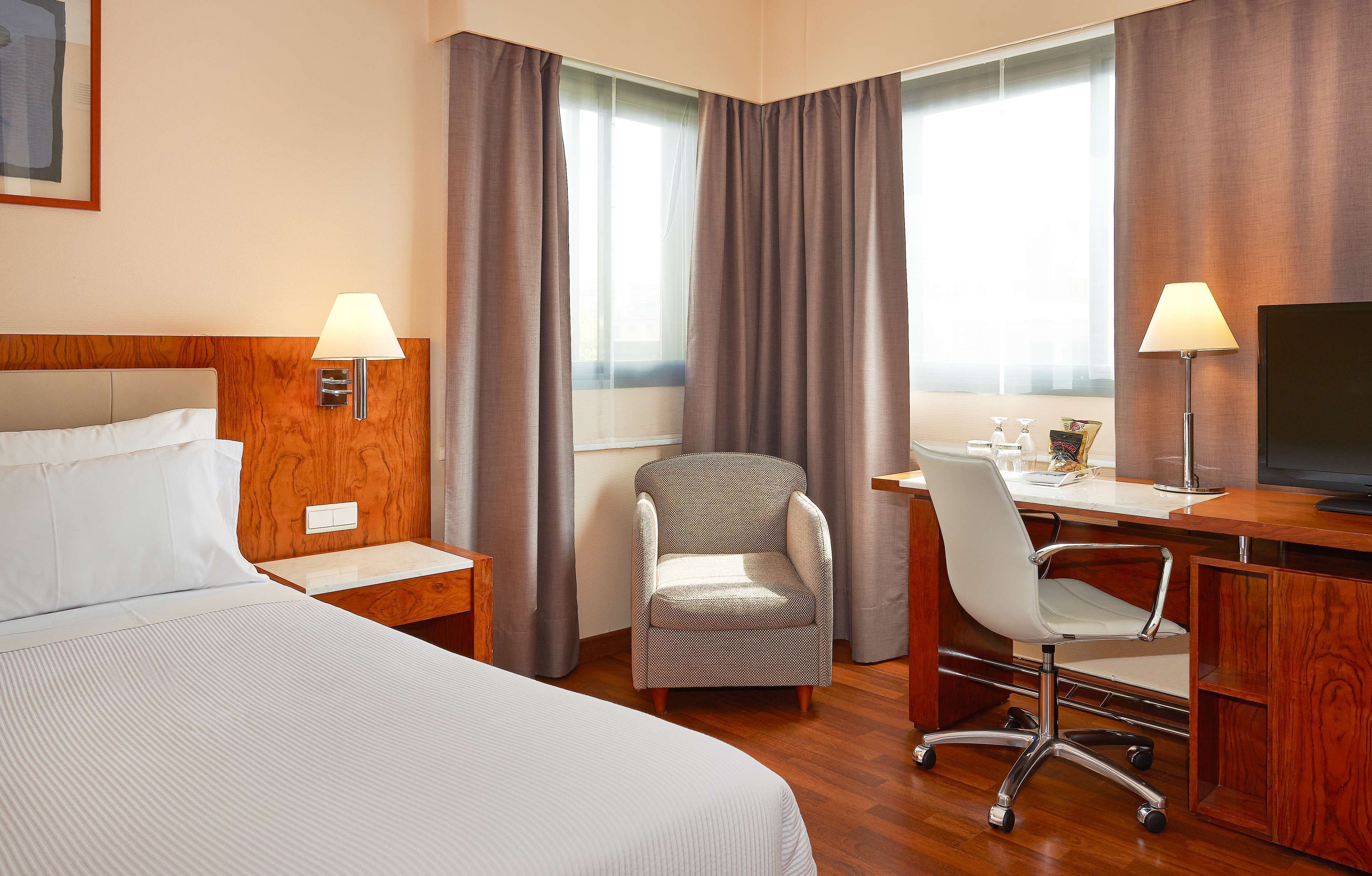 hypo-allergenic bedding, minibar, in-room safe, desk