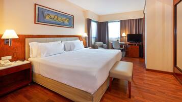 Hypoallergeen beddengoed, een minibar, een kluis op de kamer, een bureau