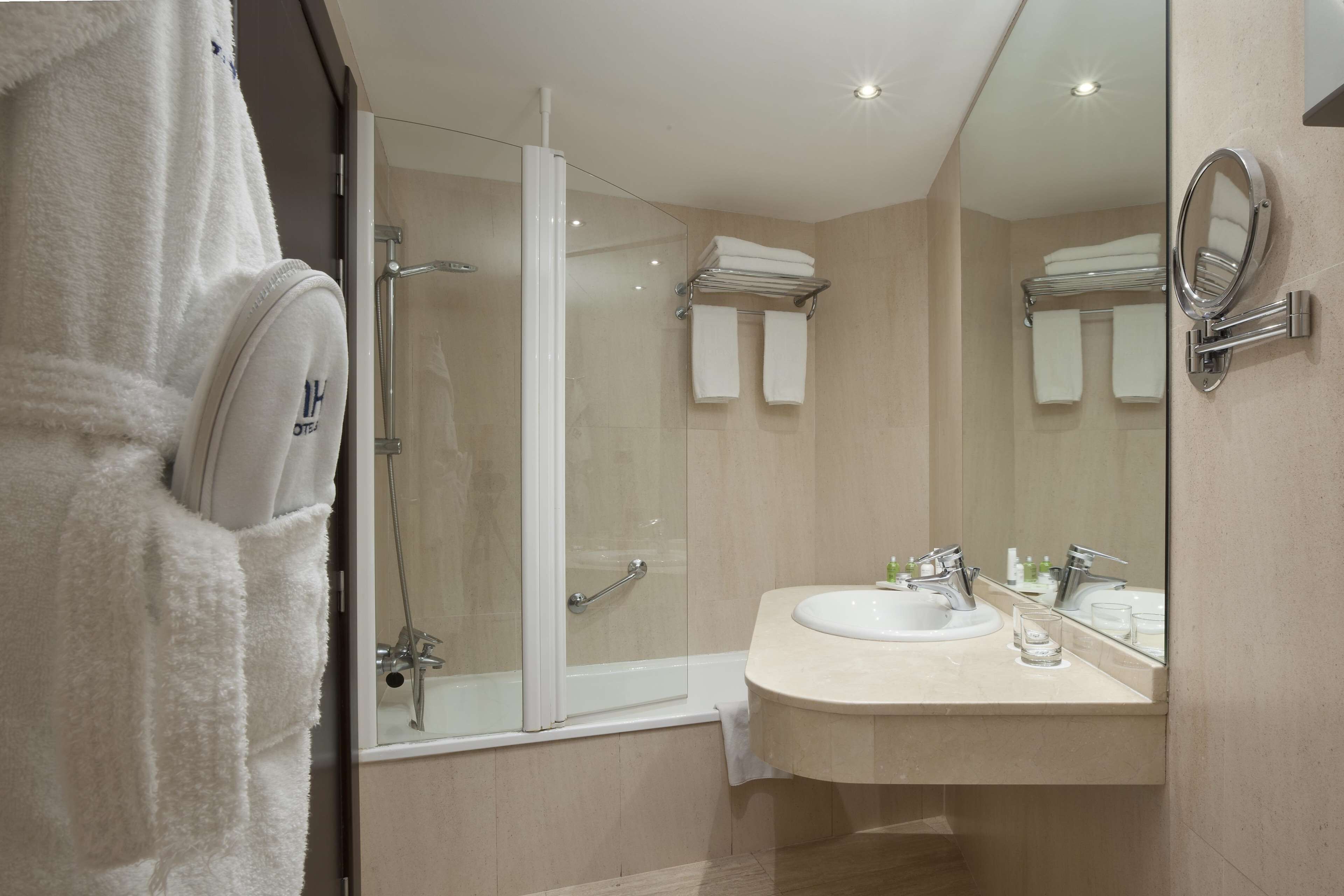 eco-friendly toiletries, hair dryer, bidet, towels