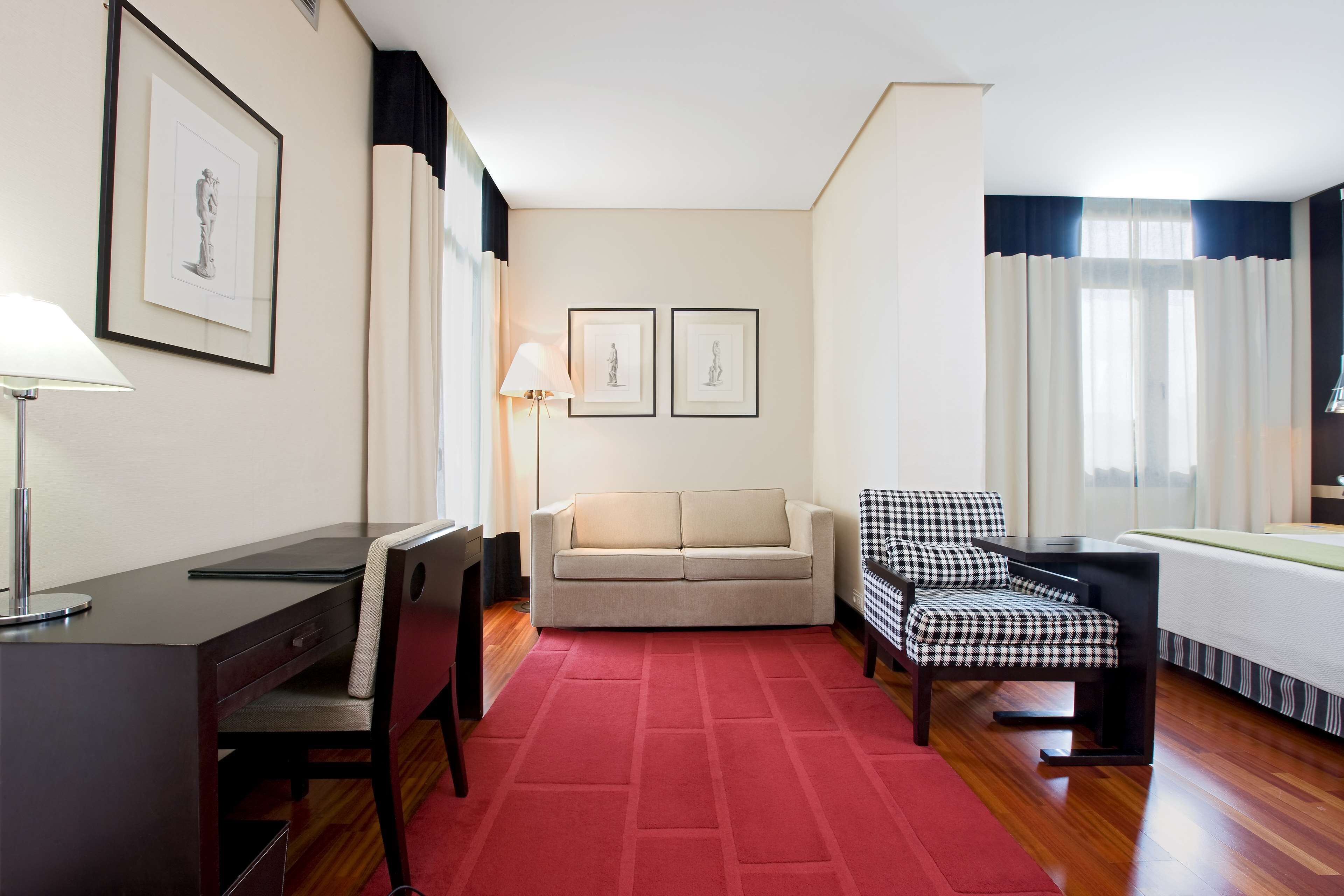 junior suite, terrace | select comfort beds, minibar, in-room safe, desk