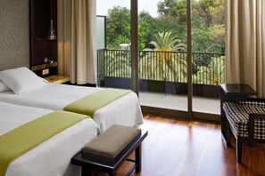 Select Comfort beds, minibar, in-room safe, desk
