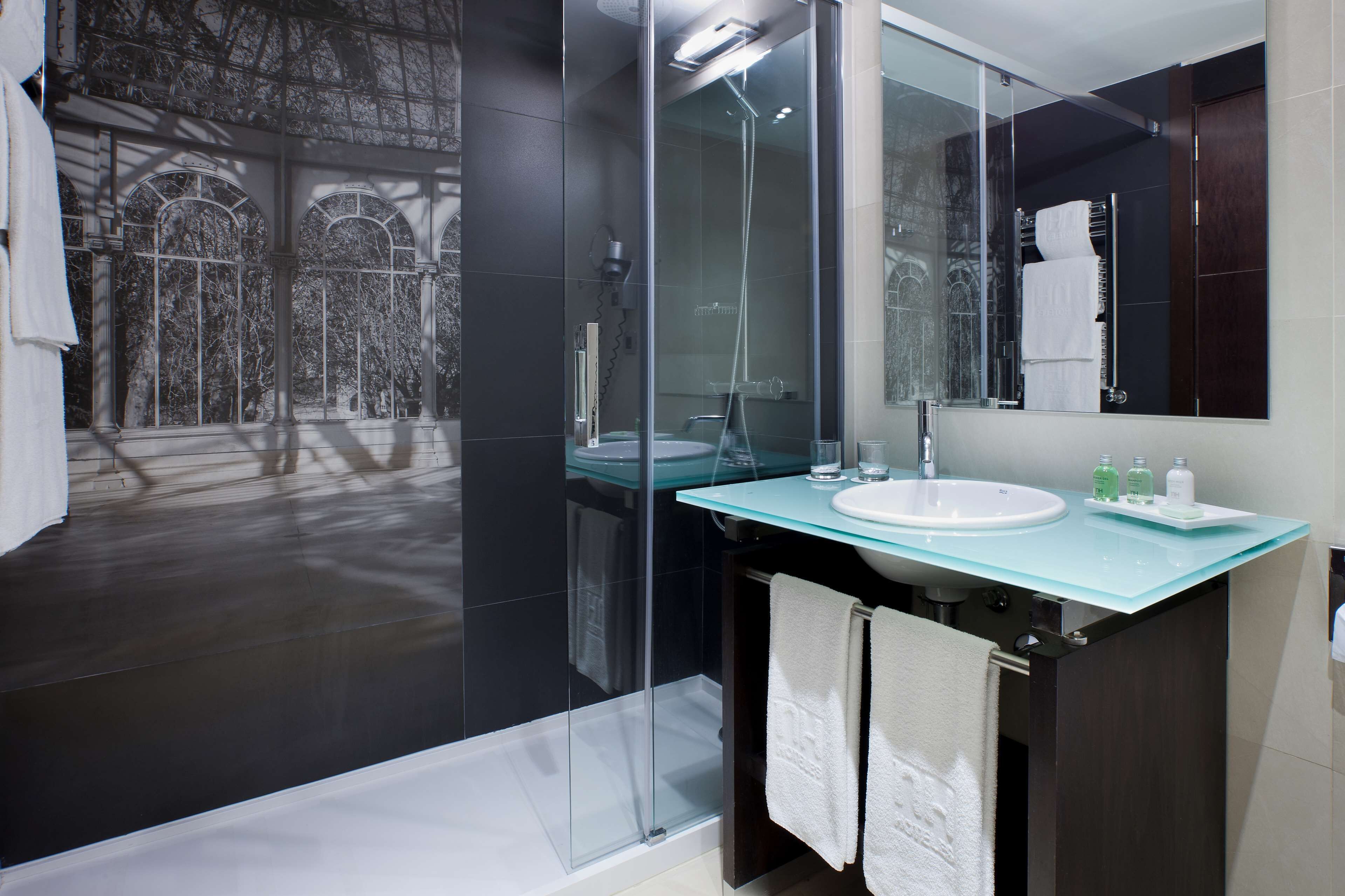 eco-friendly toiletries, hair dryer, towels