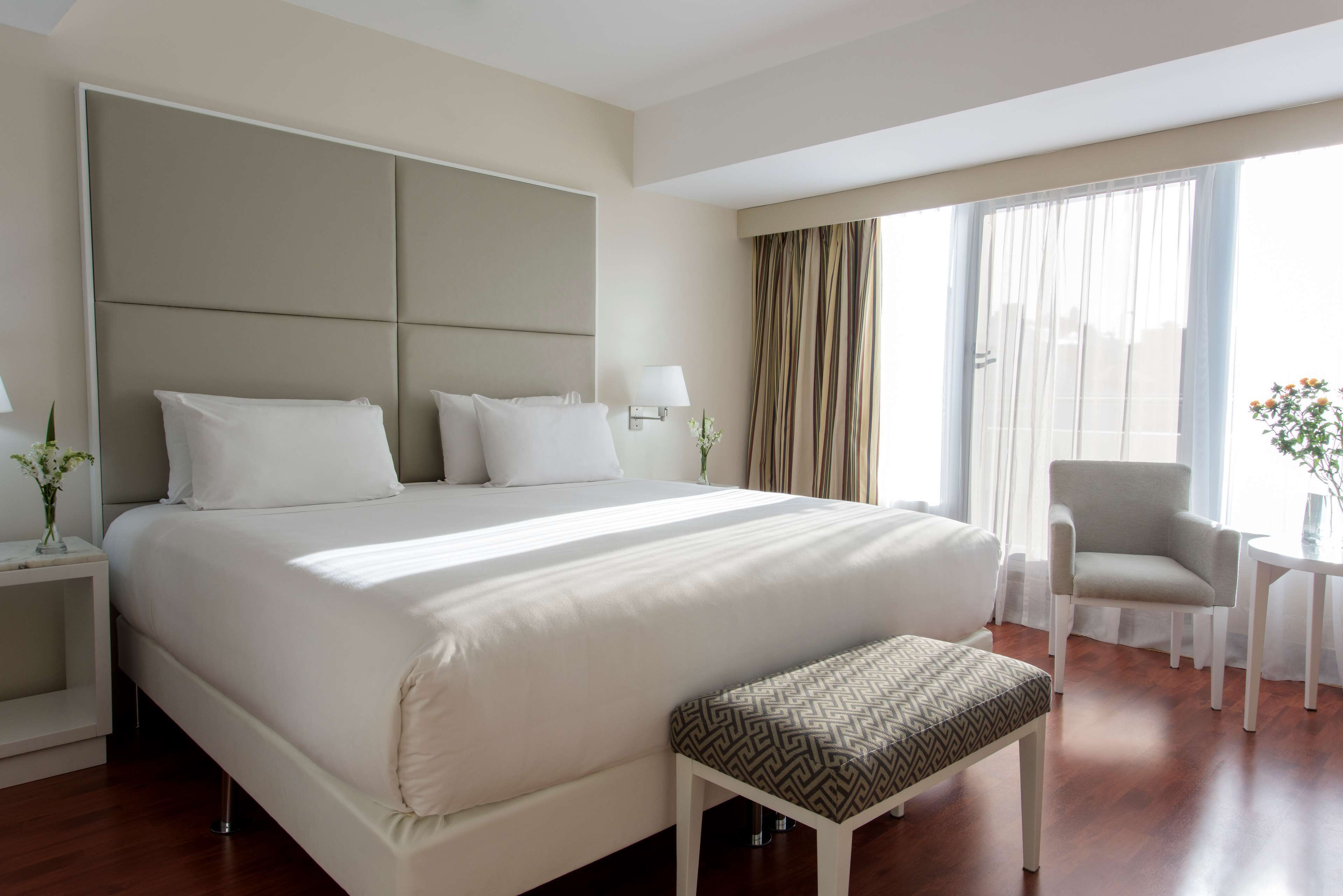 superior room, corner (view) | premium bedding, down duvets, pillow-top beds, minibar