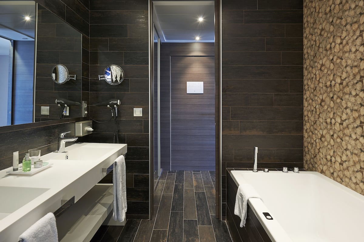 superior room (new style) | bathroom | eco-friendly toiletries, hair dryer, towels, soap