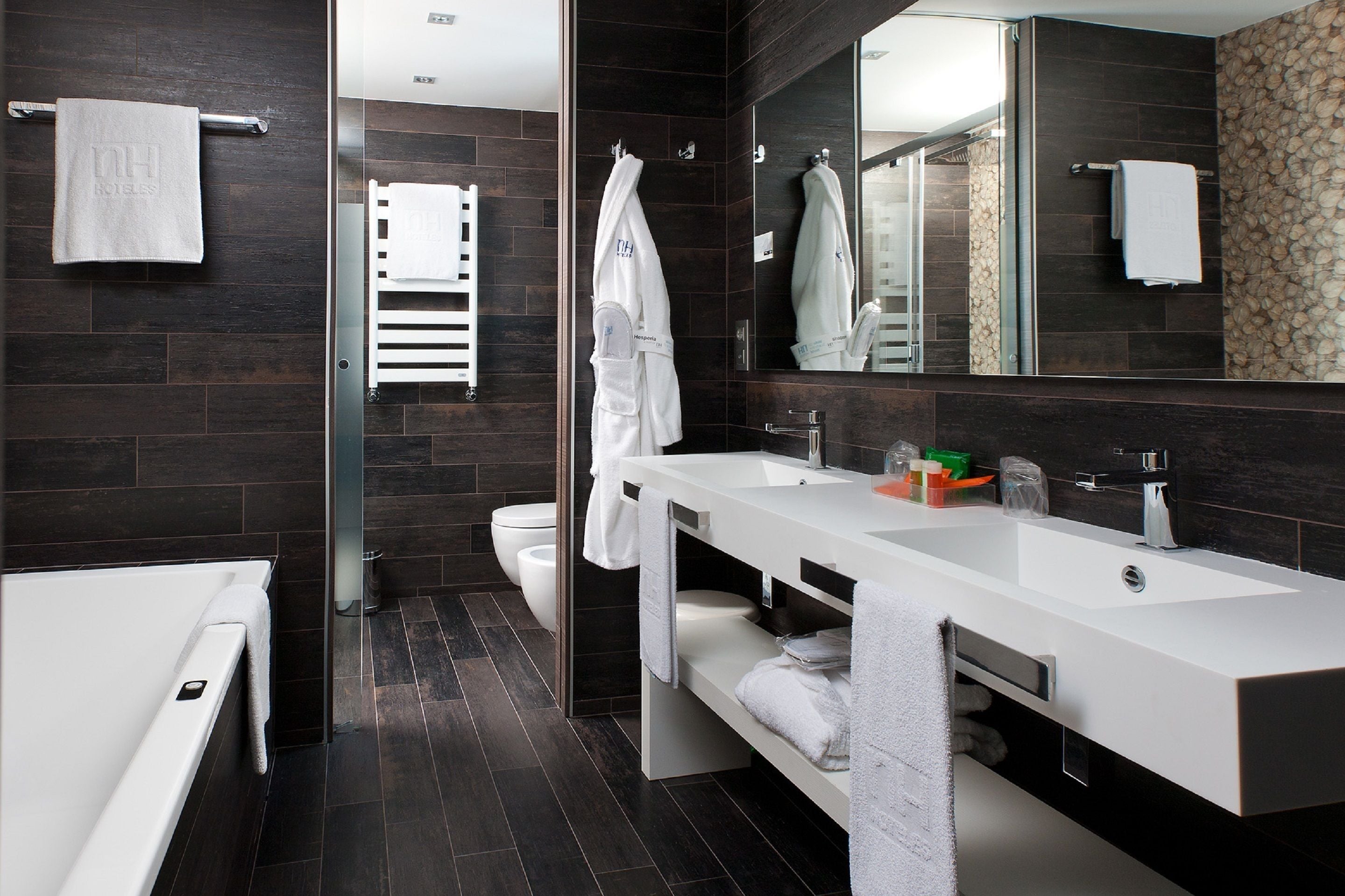 eco-friendly toiletries, hair dryer, towels, soap