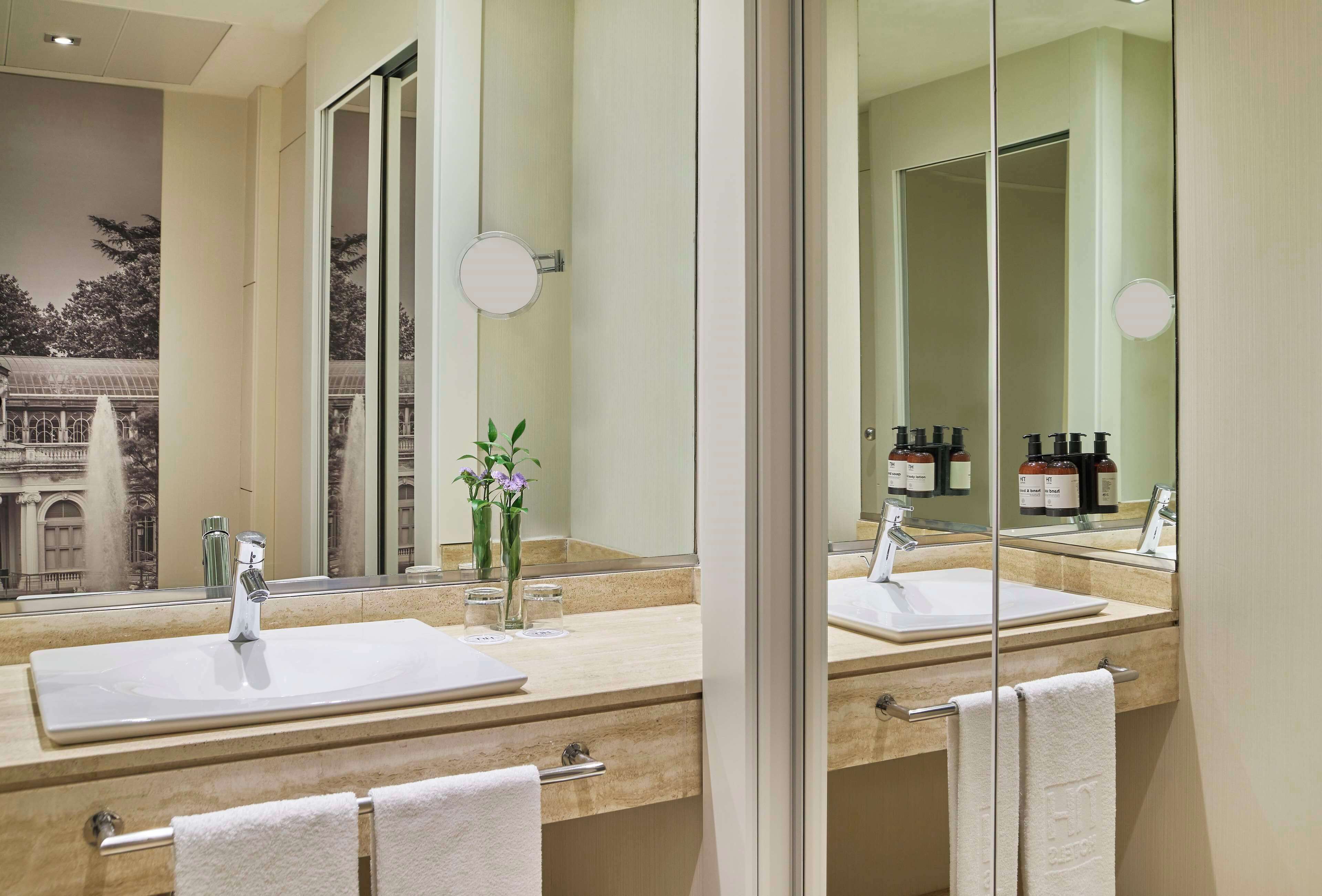 shower, eco-friendly toiletries, hair dryer, towels