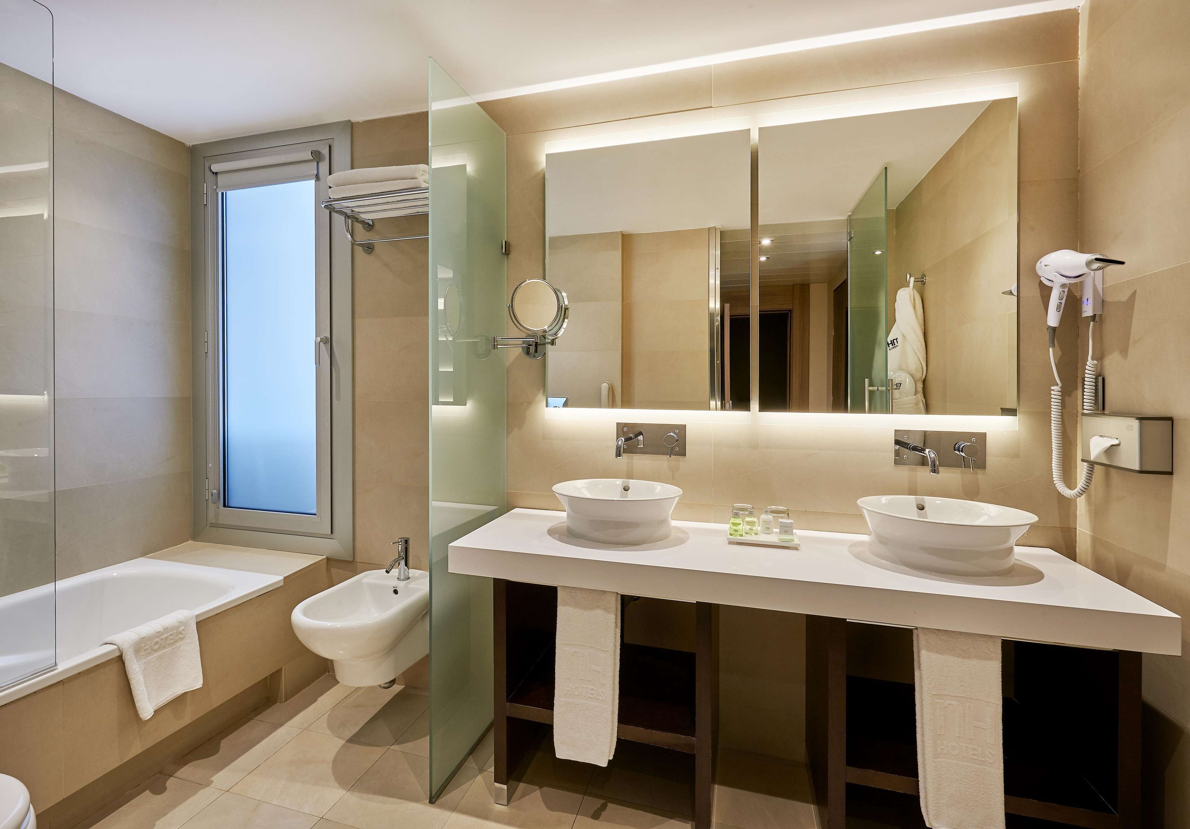 rainfall showerhead, eco-friendly toiletries, hair dryer, bidet