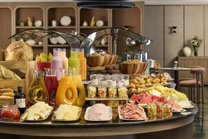Lunch, dinner served; Mediterranean cuisine, garden views 