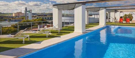 Outdoor pool, pool umbrellas, sun loungers