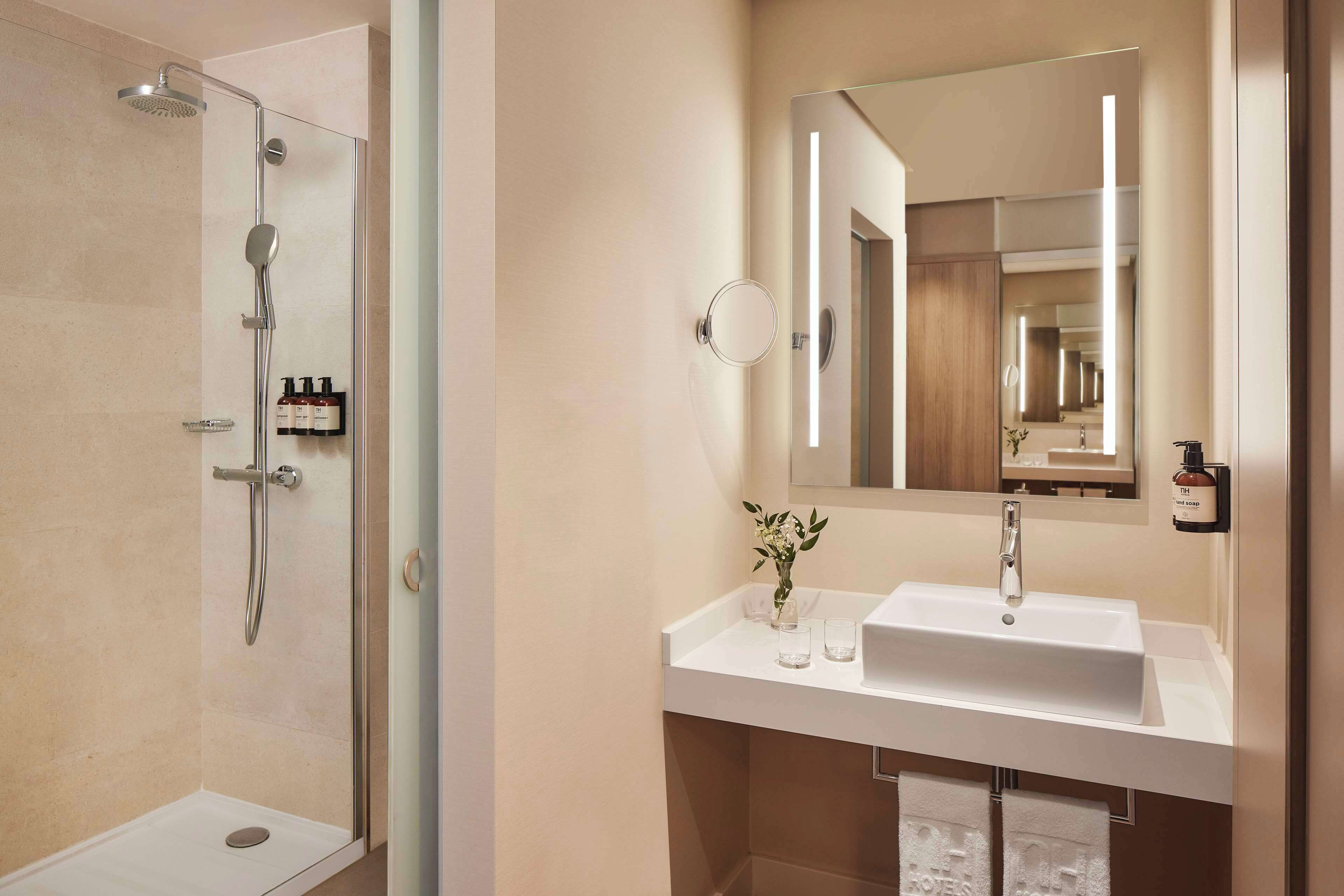 deep-soaking bathtub, rainfall showerhead, eco-friendly toiletries