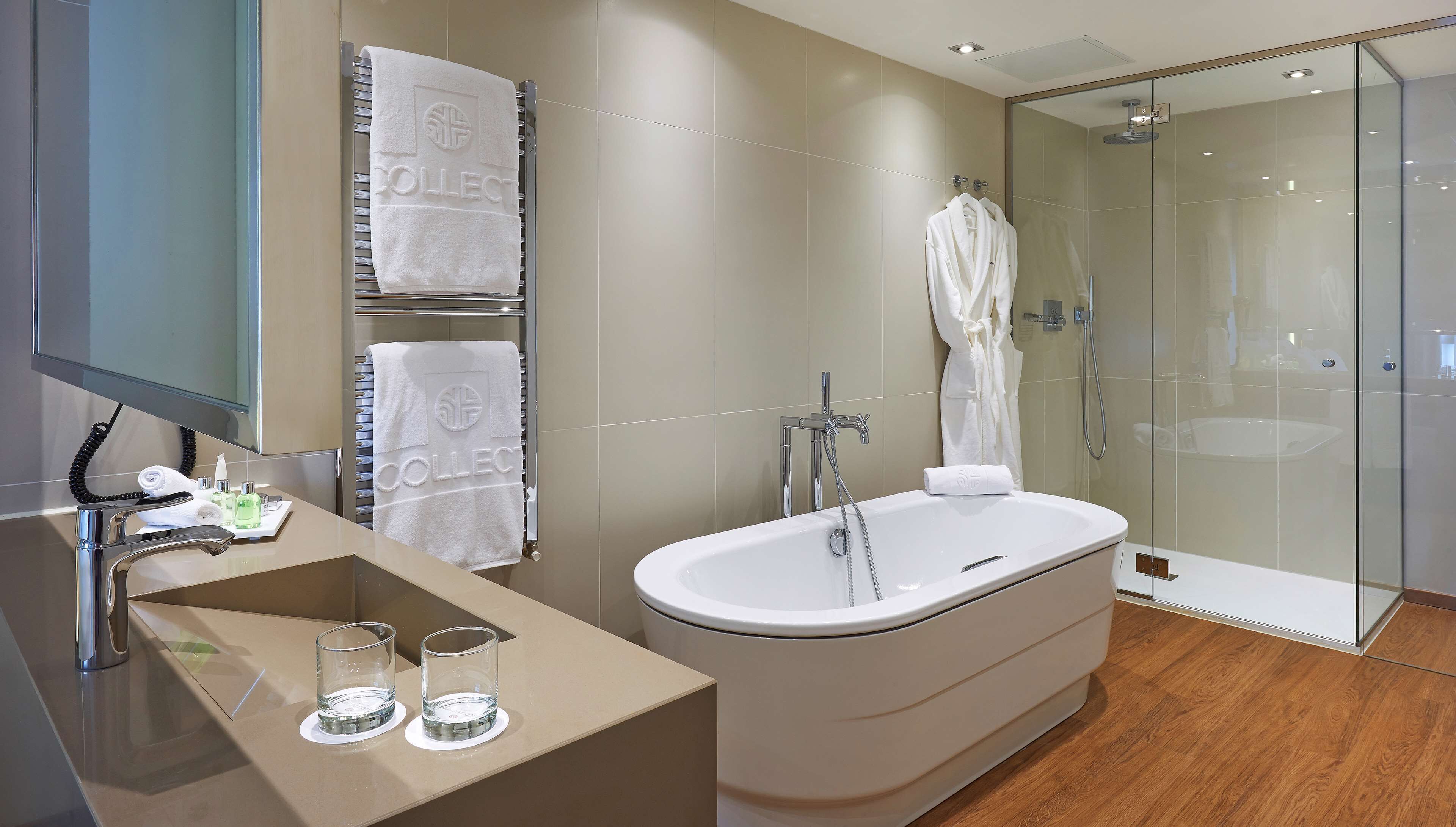 deep-soaking bathtub, rainfall showerhead, eco-friendly toiletries