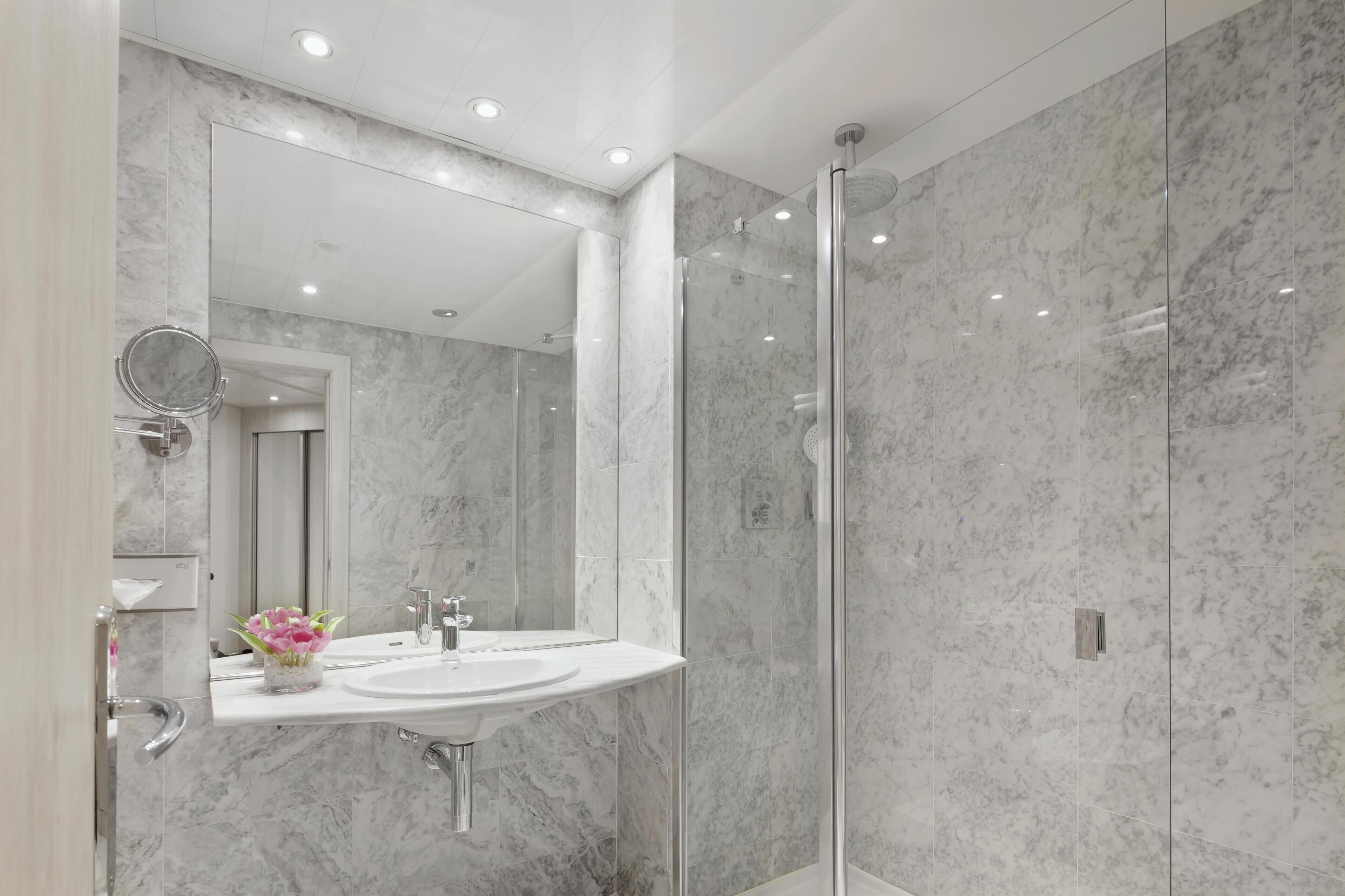 deep-soaking bathtub, rainfall showerhead, eco-friendly toiletries