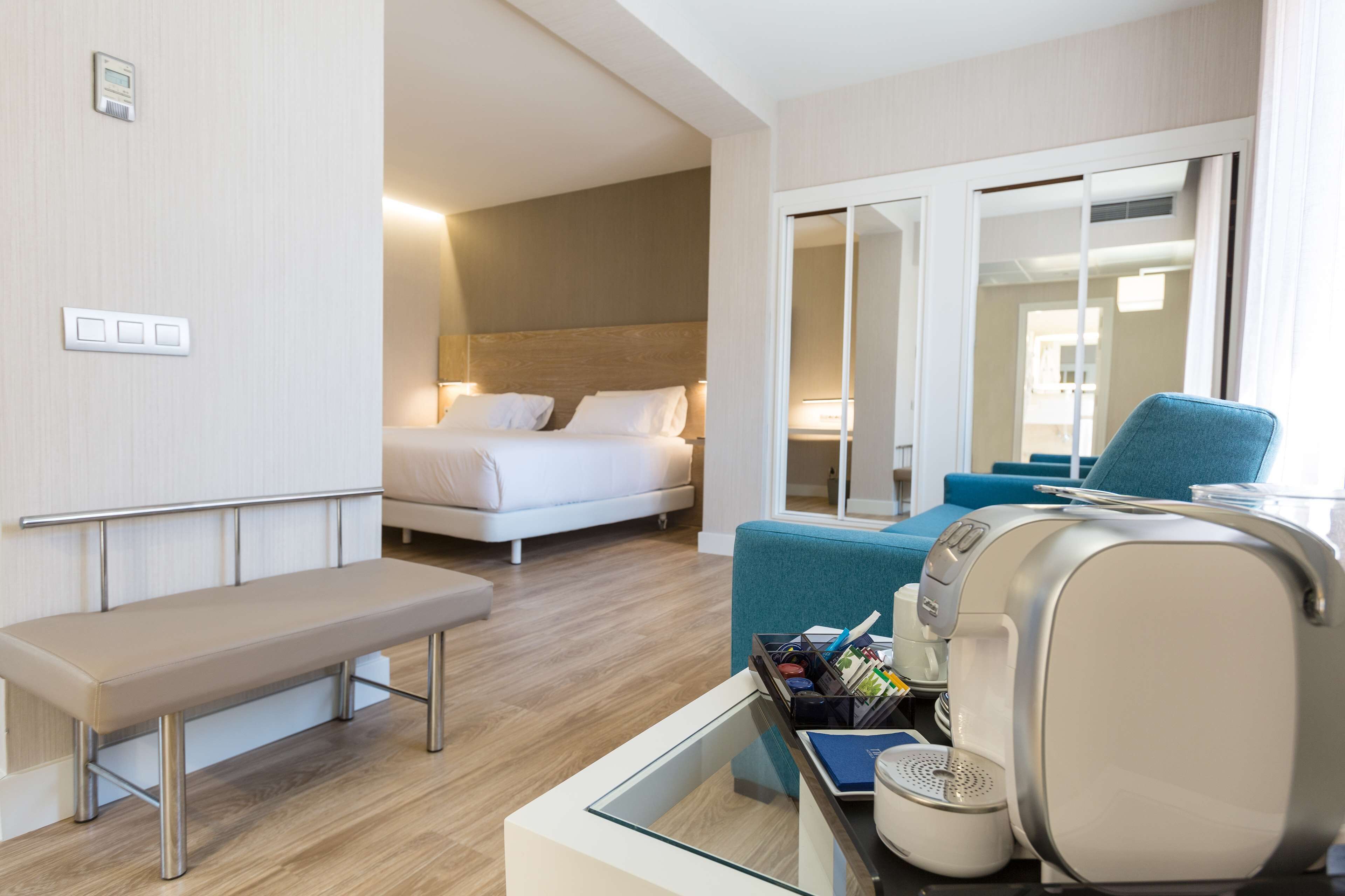 superior room | minibar, in-room safe, desk, blackout curtains