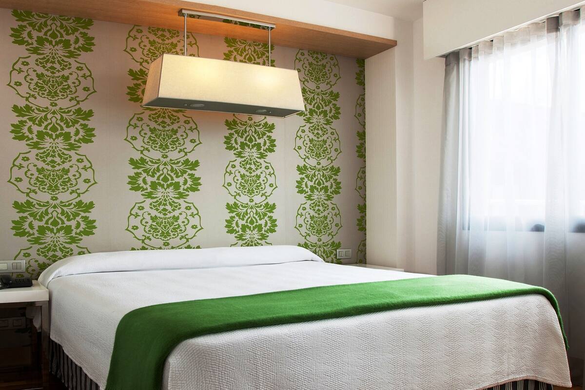 Ropa de cama de alta calidad y minibar
