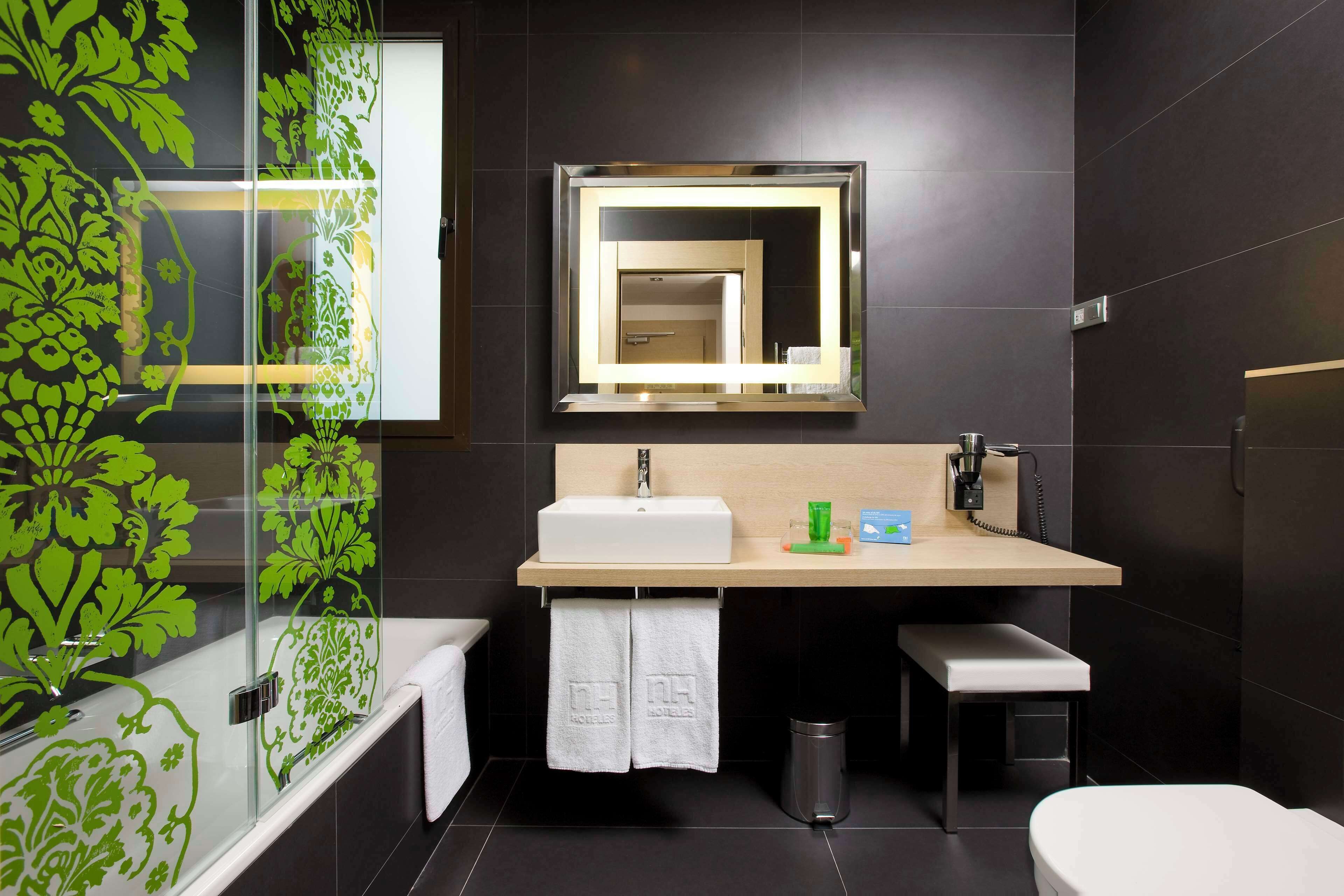 shower, eco-friendly toiletries, hair dryer, towels