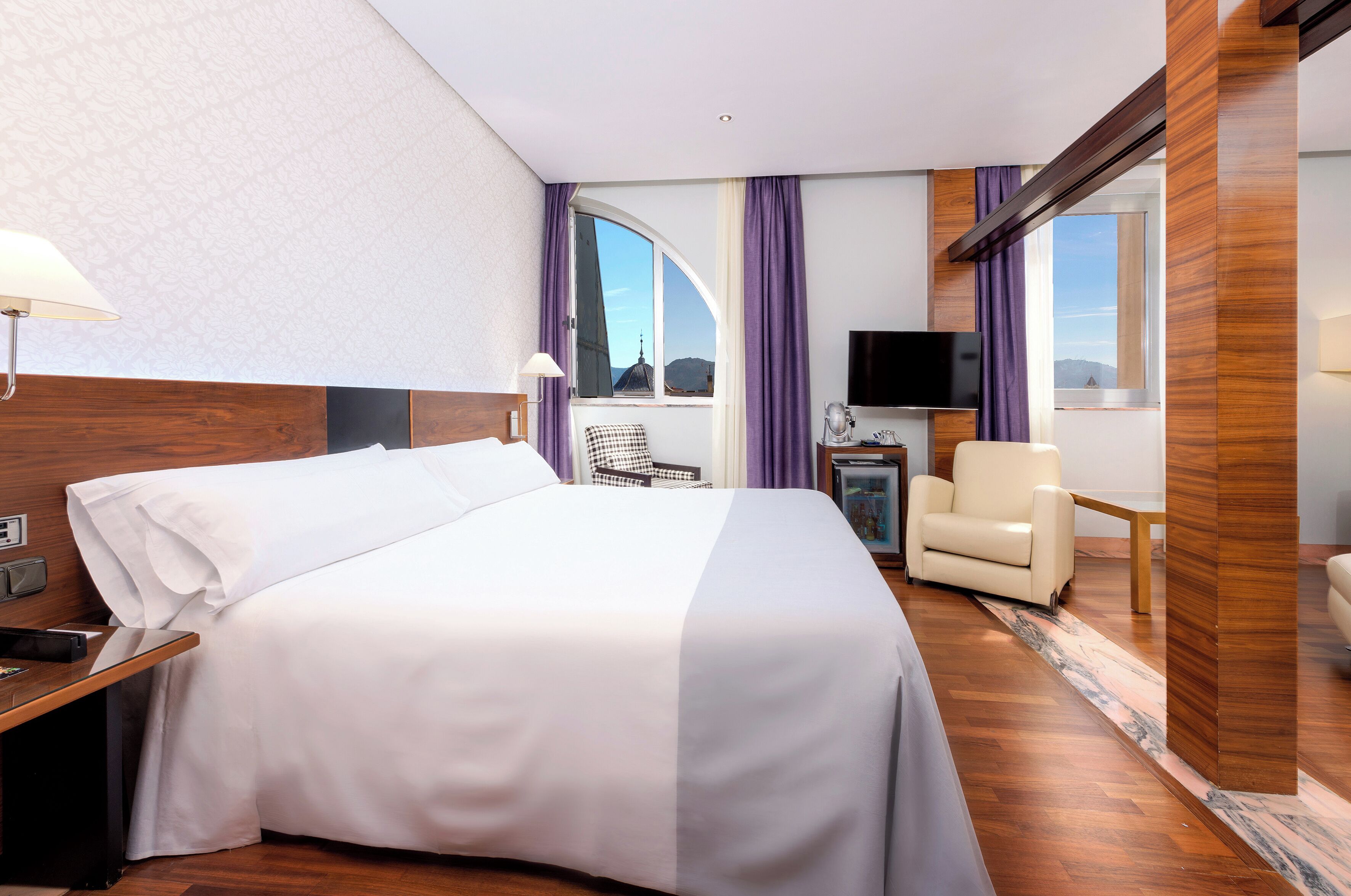 Down comforters, minibar, in-room safe, desk