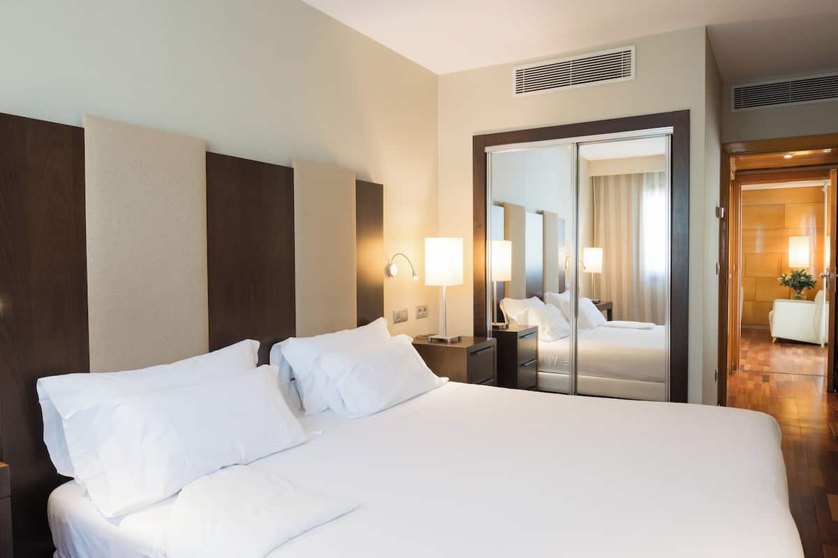 junior suite | minibar, in-room safe, desk, laptop workspace