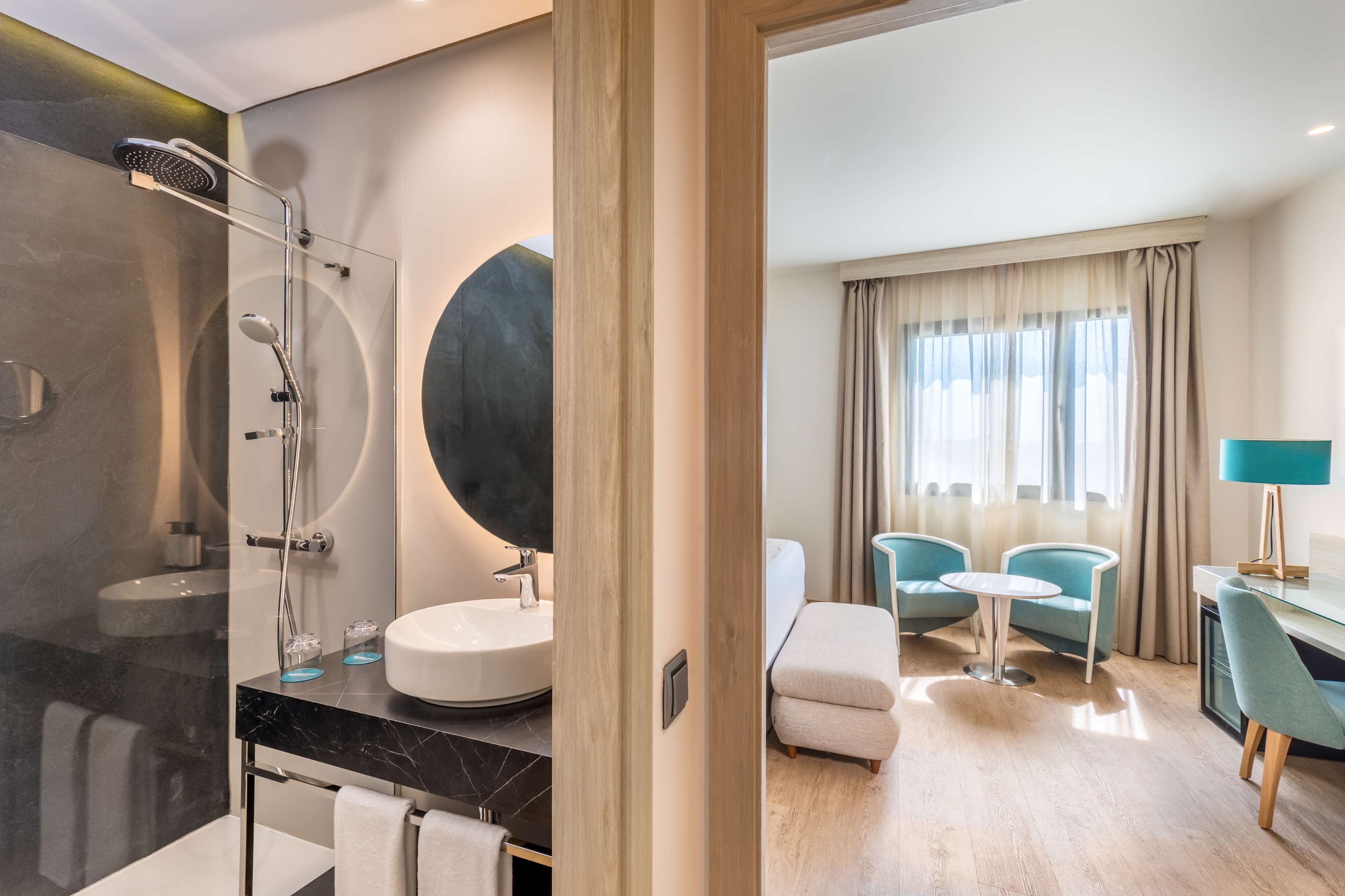 rainfall showerhead, hair dryer, towels, soap