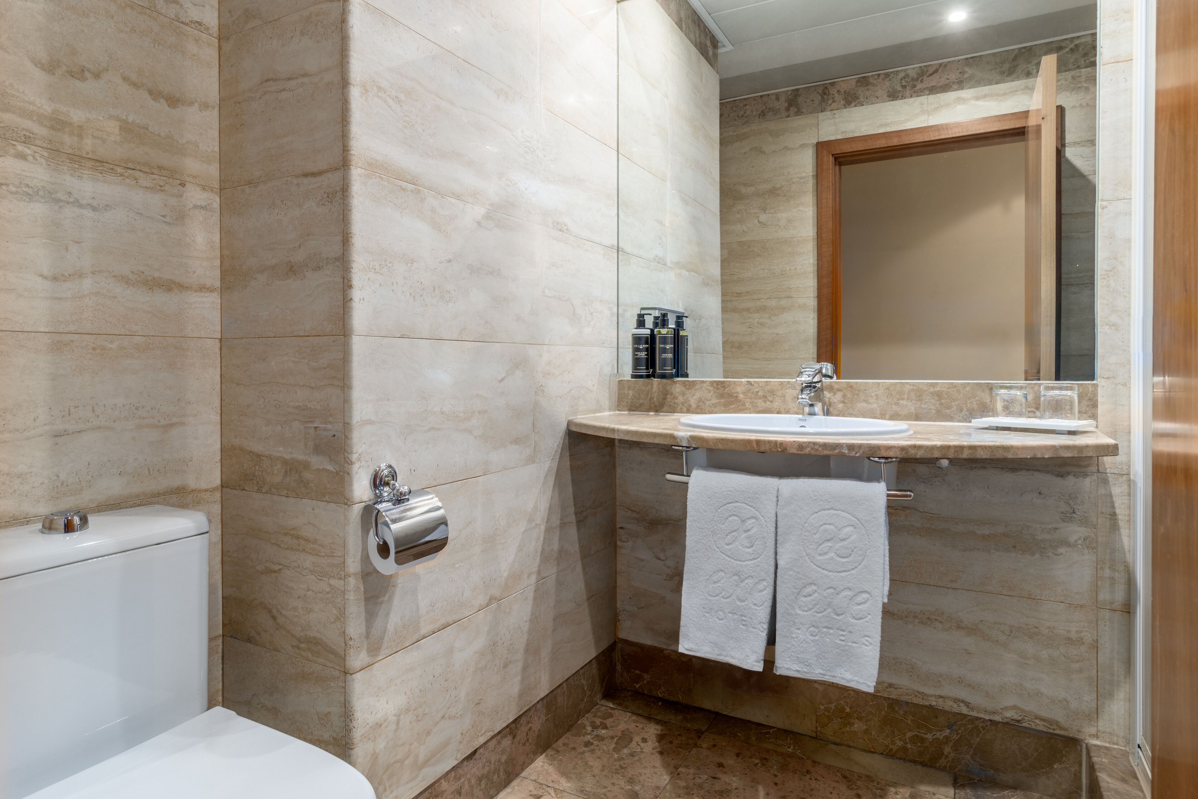 shower, eco-friendly toiletries, hair dryer, towels