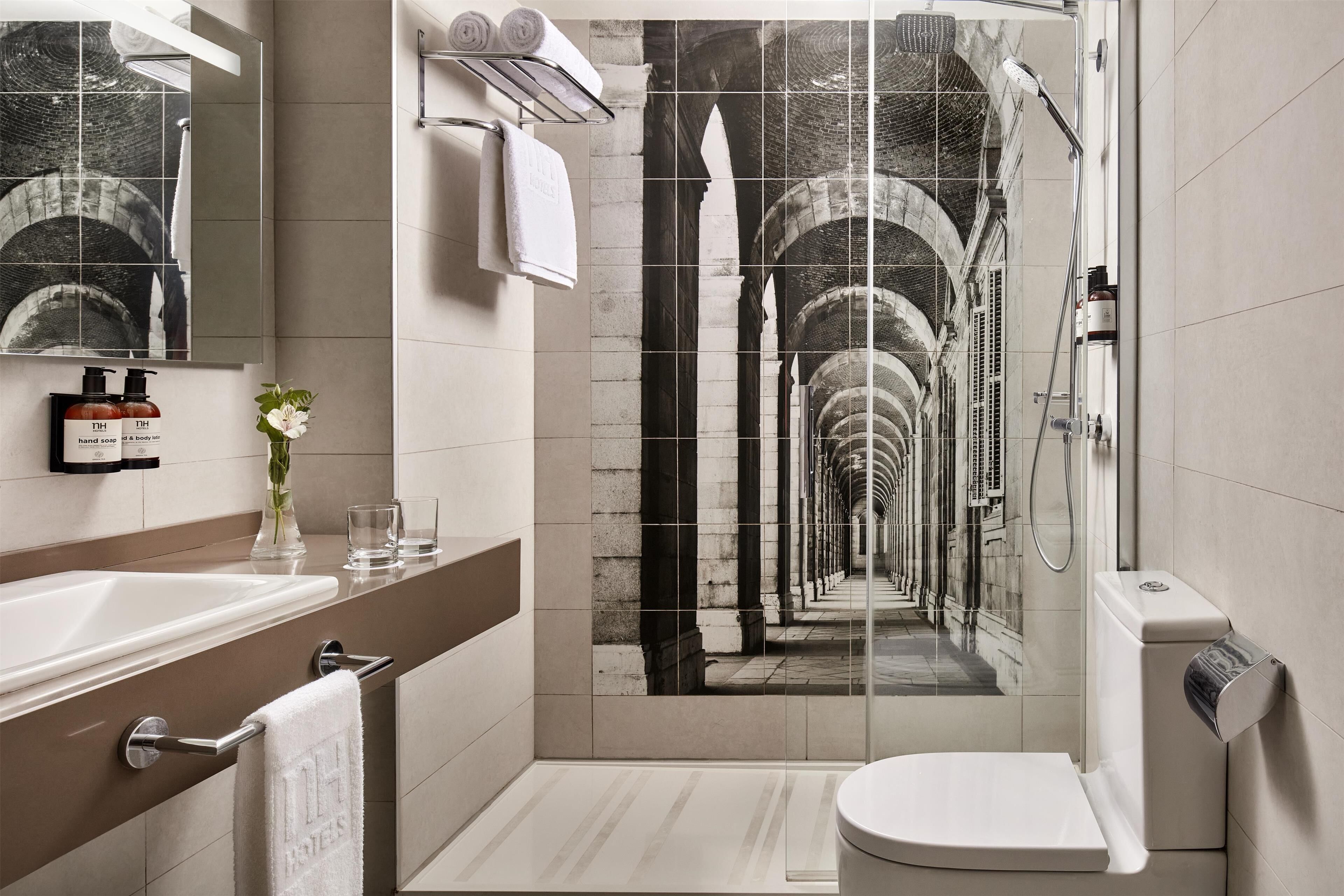 eco-friendly toiletries, hair dryer, towels