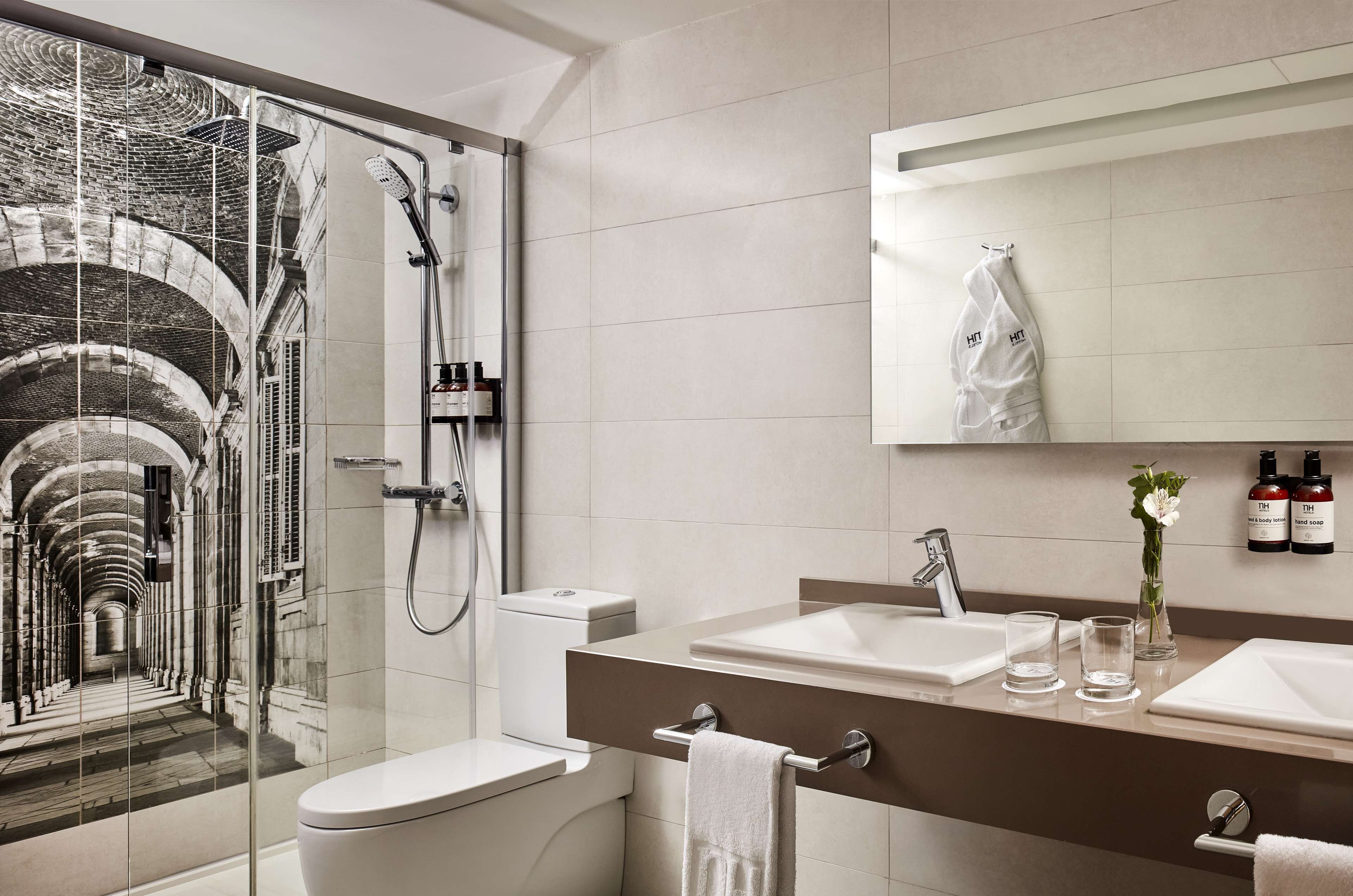 eco-friendly toiletries, hair dryer, towels