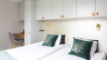 Premium bedding, pillow-top beds, in-room safe, individually decorated