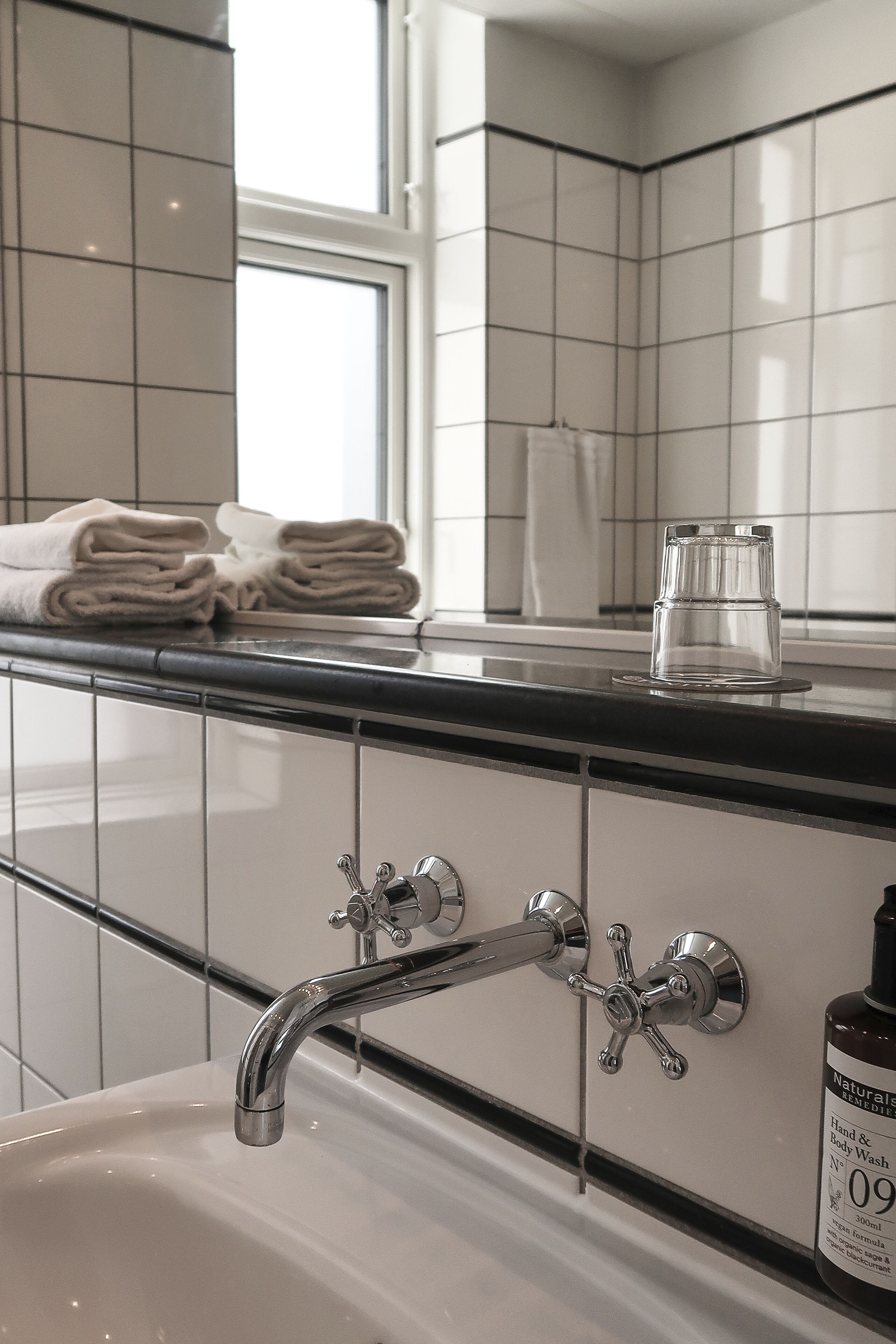 design single room | bathroom | designer toiletries, hair dryer, towels, soap