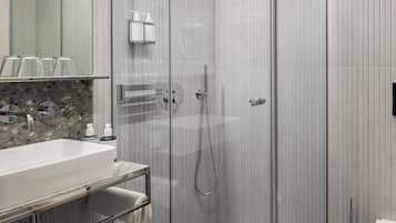 Shower, eco-friendly toiletries, hair dryer, towels