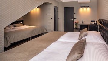 Standard Quadruple Room | 1 bedroom, premium bedding, memory foam beds, in-room safe