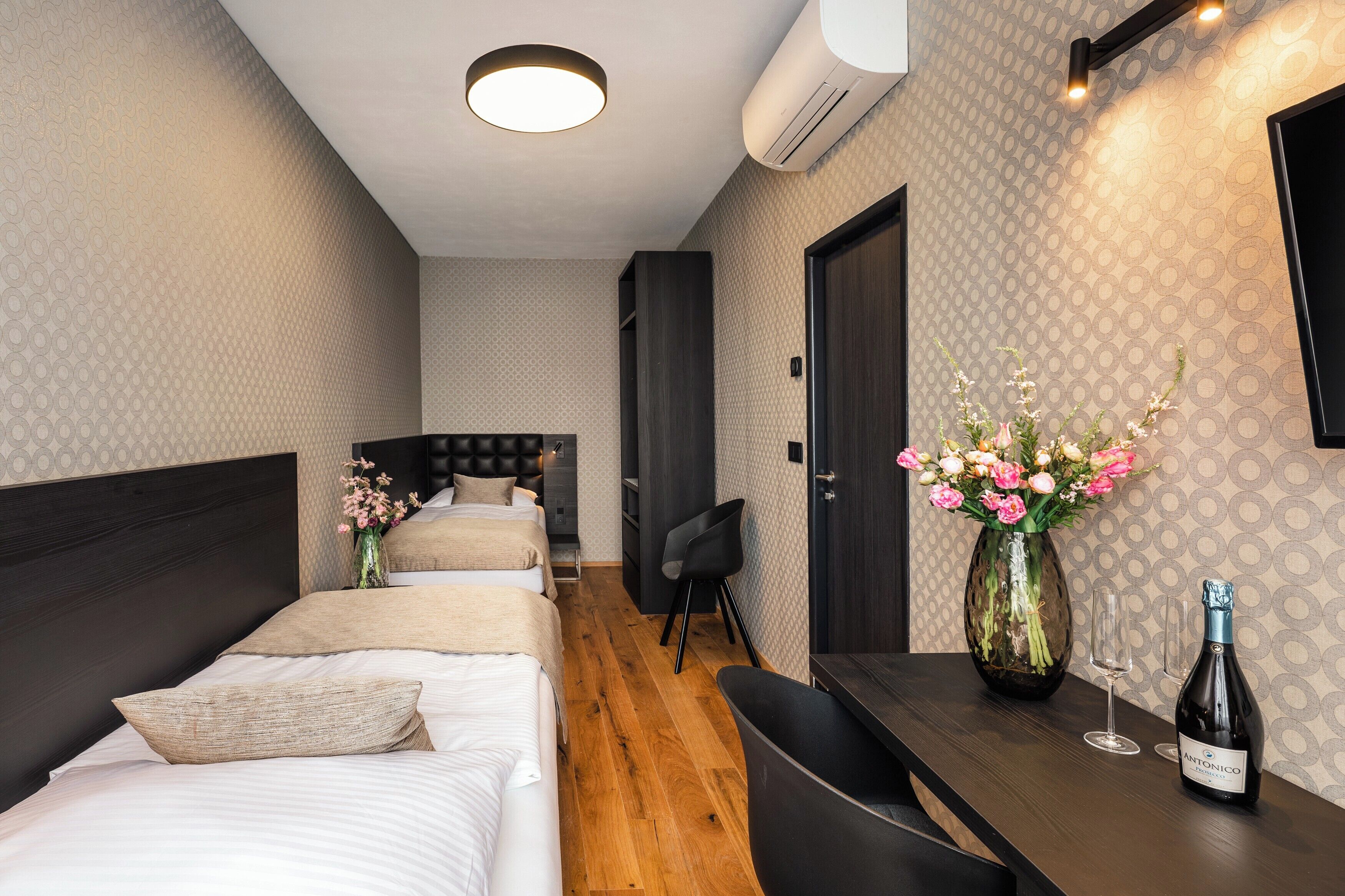 Family Room | Premium bedding, memory foam beds, in-room safe, individually furnished
