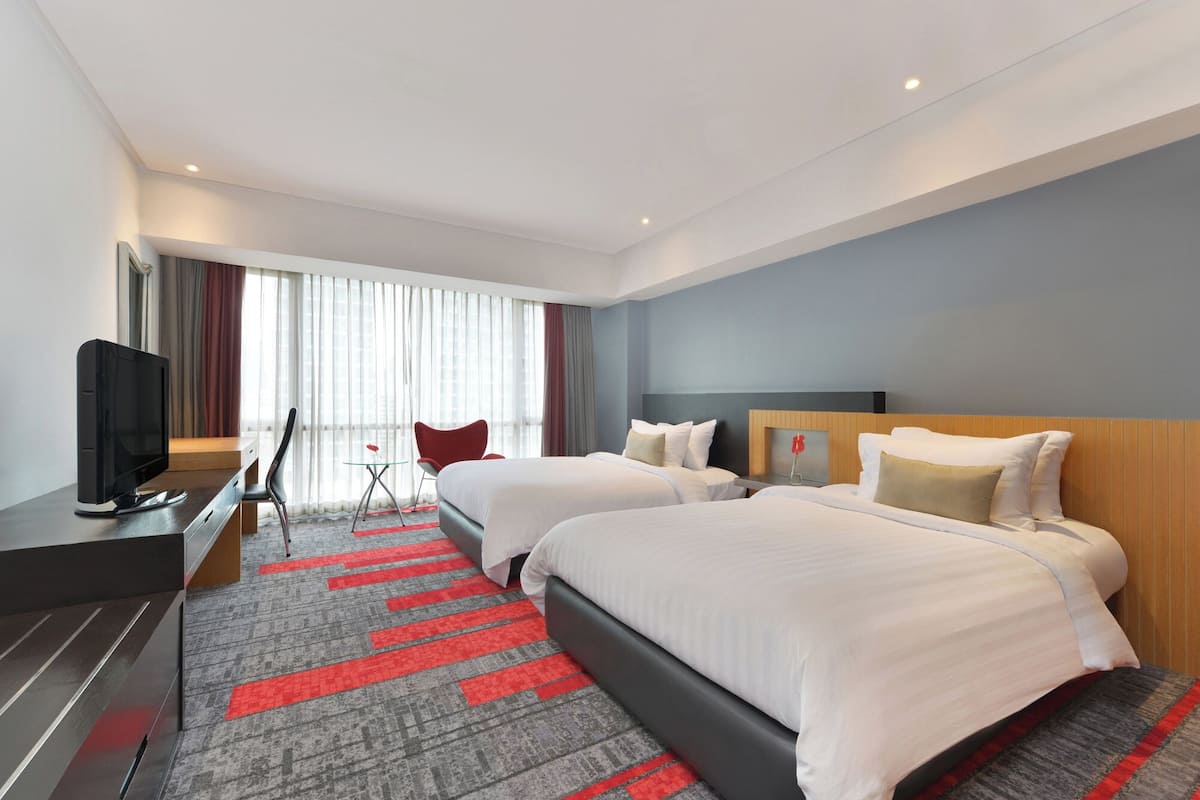 Deluxe Twin Bed | In-room safe, blackout curtains, soundproofing, iron/ironing board