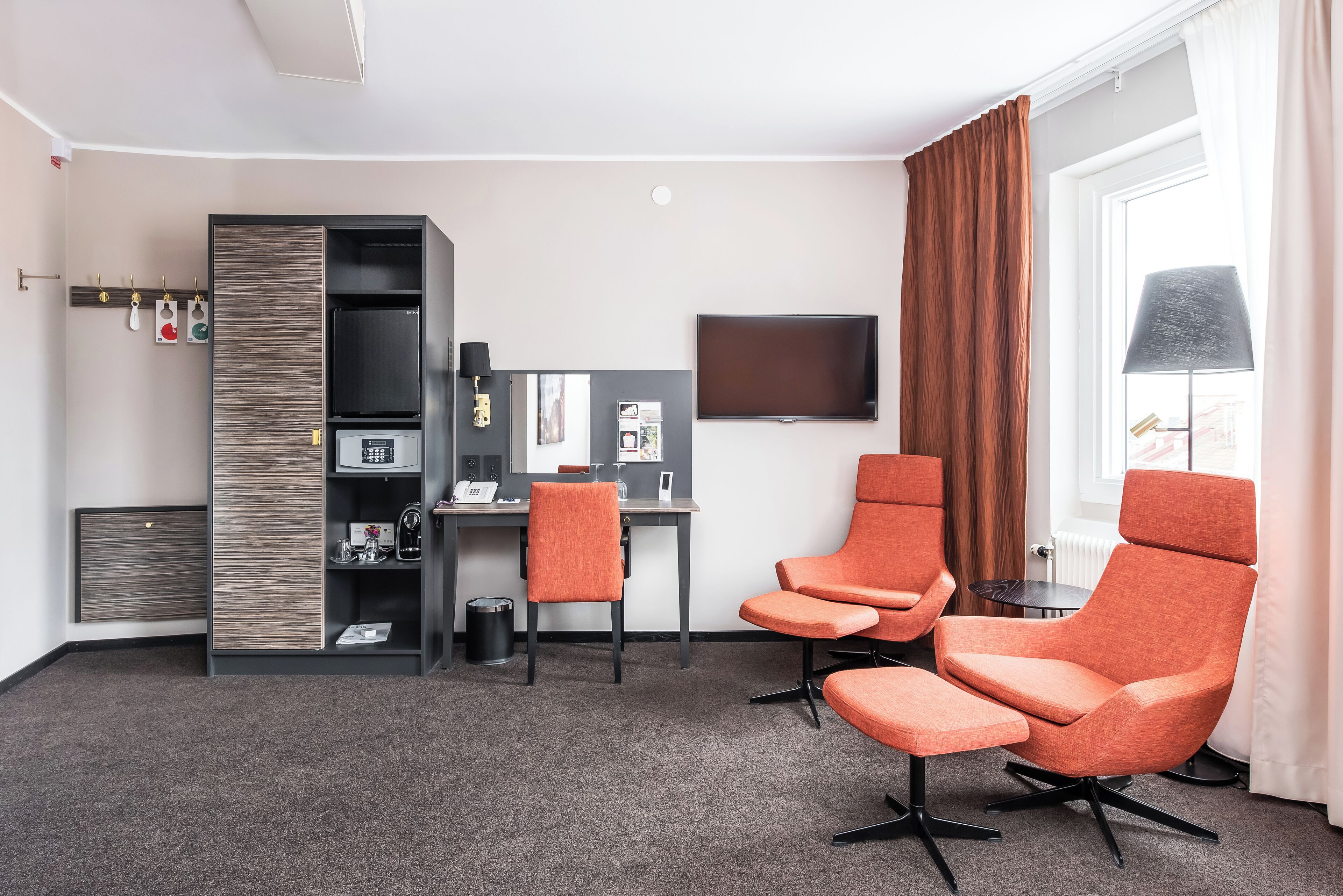 deluxe double room | in-room safe, desk, laptop workspace, blackout curtains