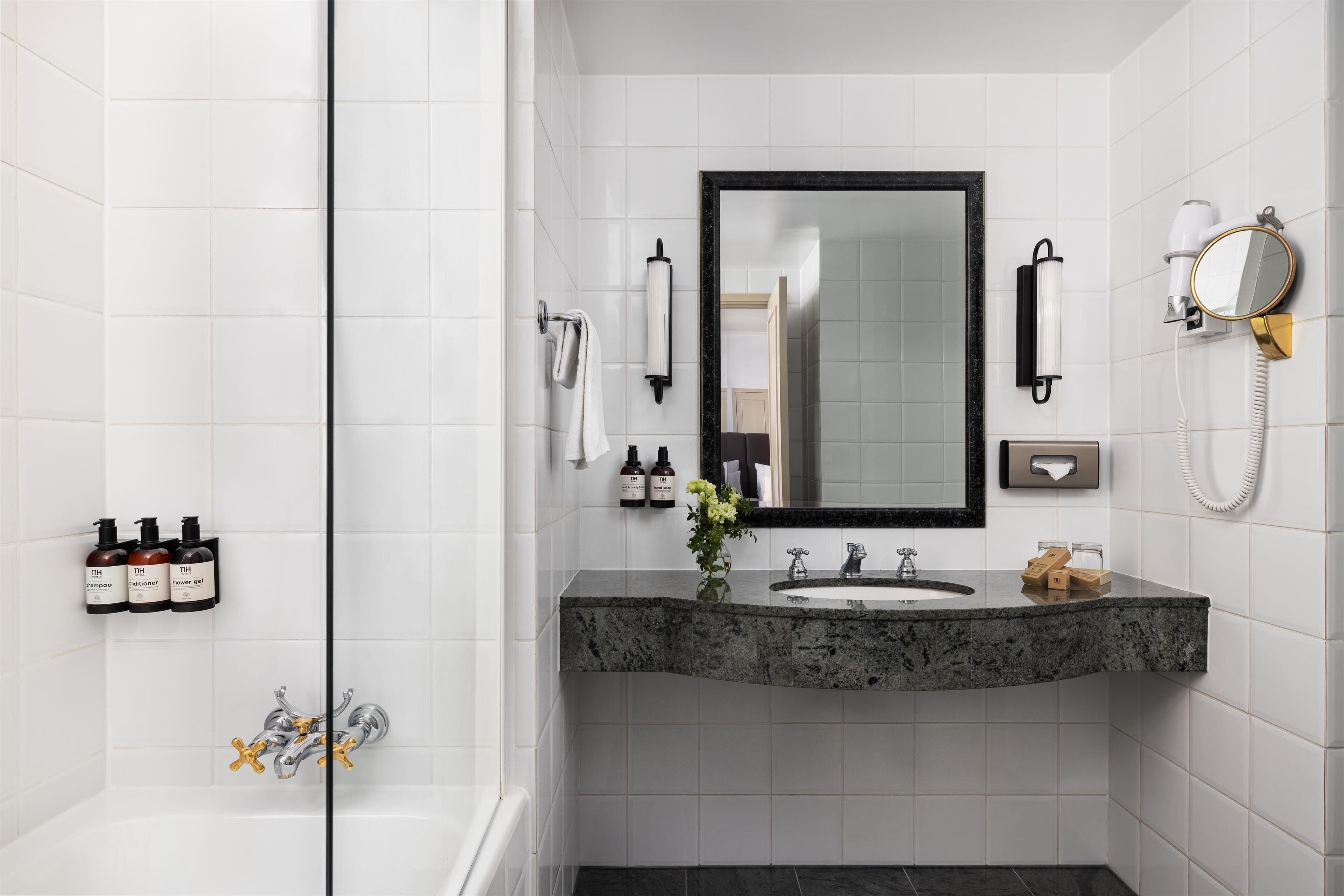 shower, eco-friendly toiletries, hair dryer, towels