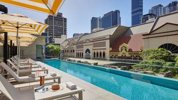 Outdoor pool, open 6:00 AM to 8:00 PM, pool umbrellas, sun loungers