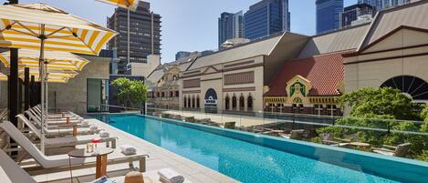 Outdoor pool, open 6:00 AM to 8:00 PM, pool umbrellas, pool loungers