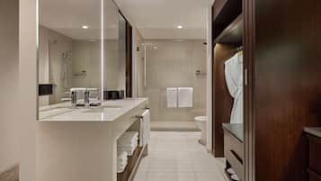 Shower, designer toiletries, hair dryer, towels