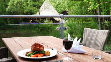 Breakfast, lunch, dinner served; local cuisine, al fresco dining